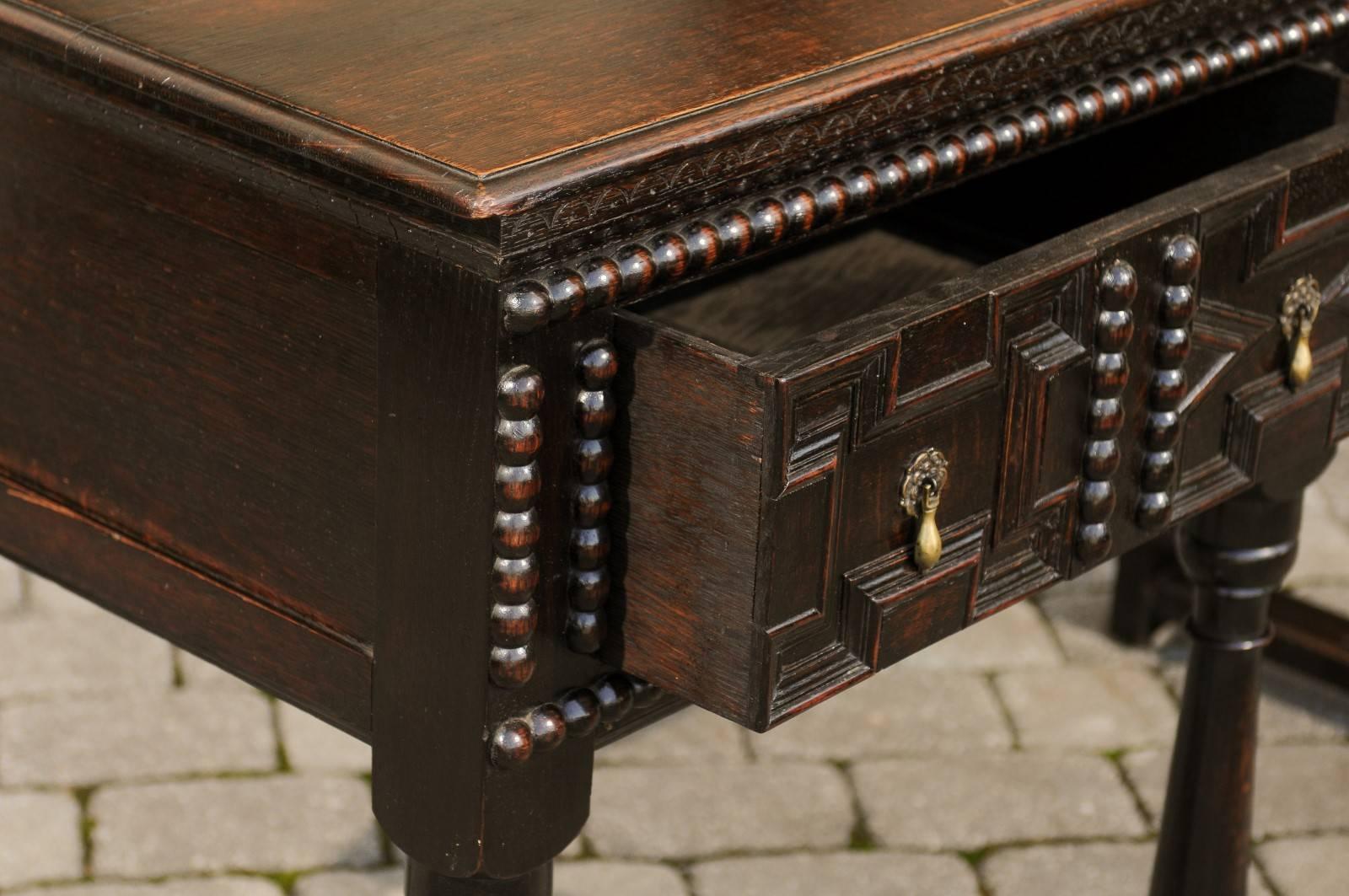 English 1880s Geometric Front Two-Drawer Dark Oak Server with Baluster Legs 1