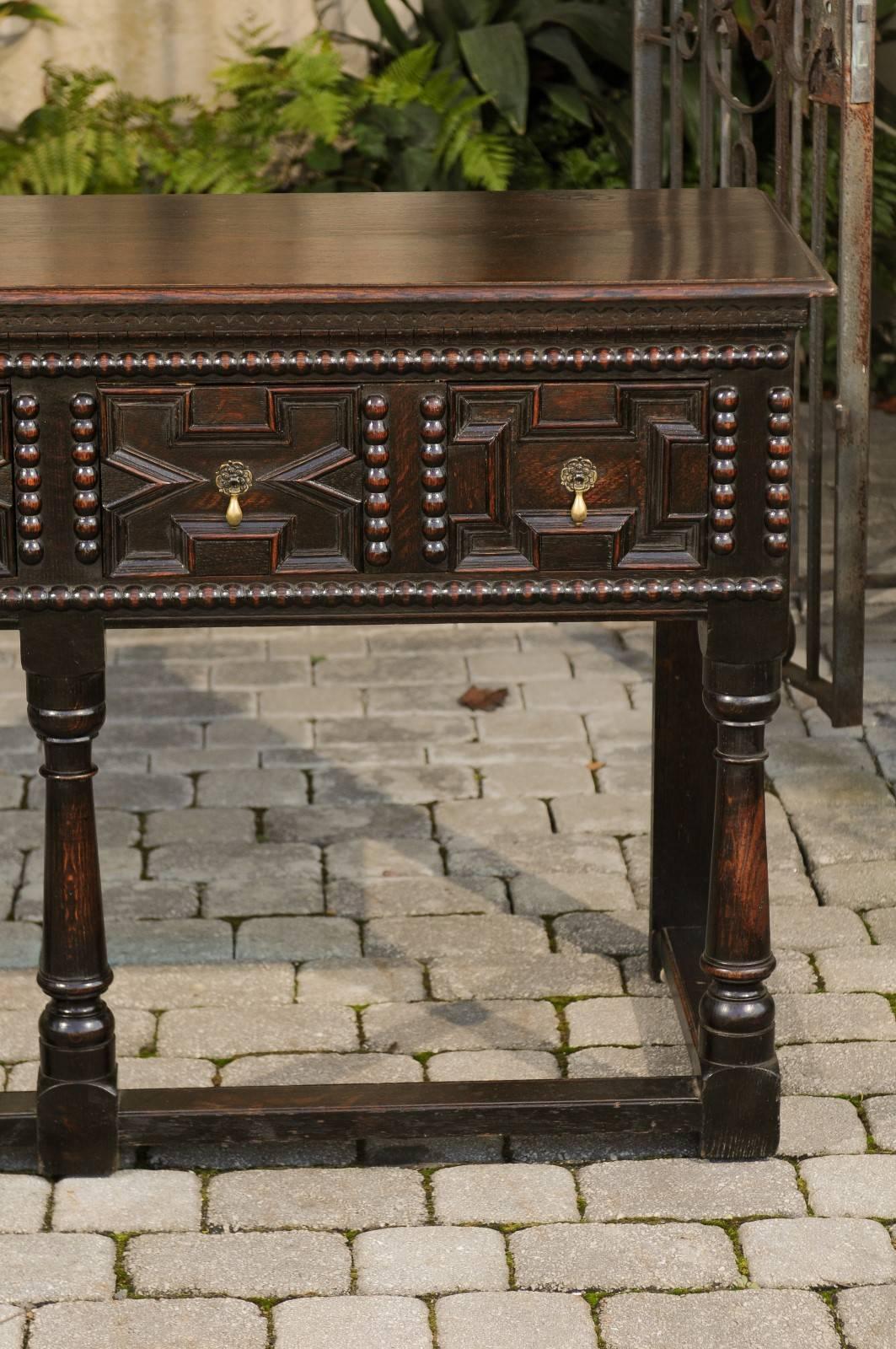 English 1880s Geometric Front Two-Drawer Dark Oak Server with Baluster Legs In Good Condition In Atlanta, GA