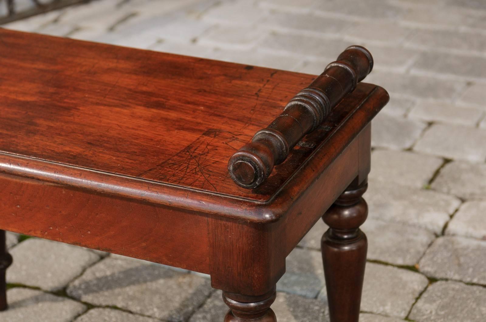 English 1870s Mahogany Hall Bench with Cylindrical Armrests and Turned Legs 4
