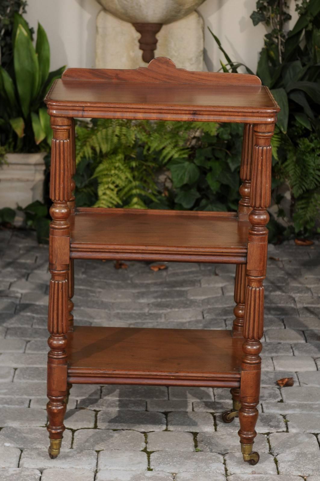English 1870s Narrow Walnut Three-Tiered Trolley on Casters with Fluted Legs 2