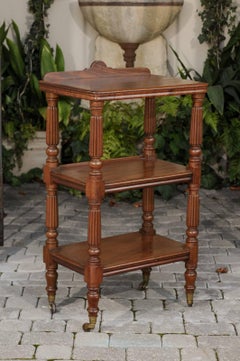English 1870s Narrow Walnut Three-Tiered Trolley on Casters with Fluted Legs