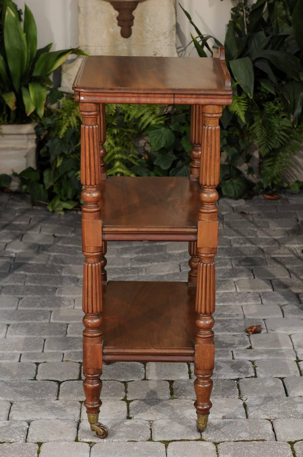 English 1870s Narrow Walnut Three-Tiered Trolley on Casters with Fluted Legs 3