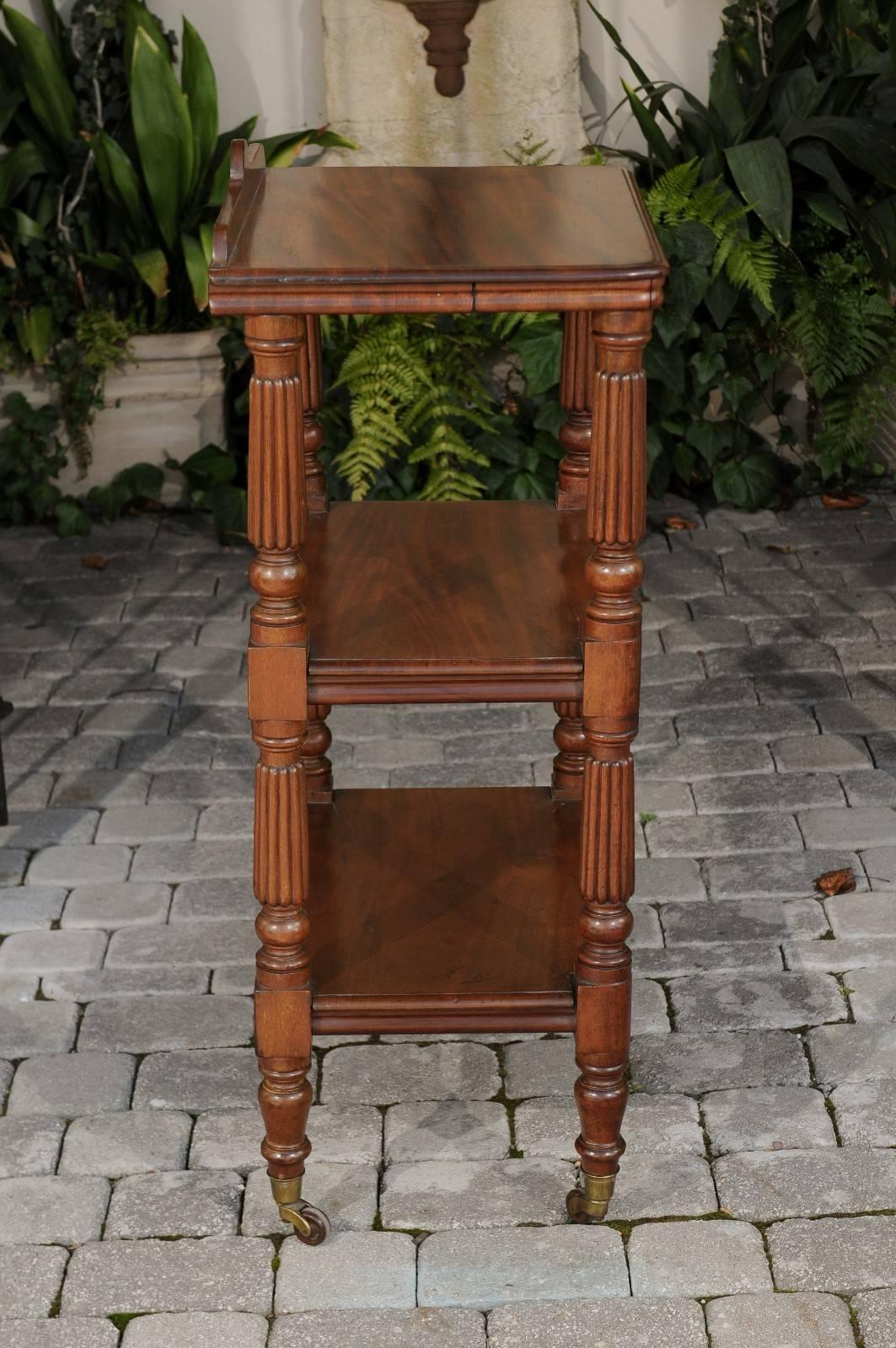 English 1870s Narrow Walnut Three-Tiered Trolley on Casters with Fluted Legs 5