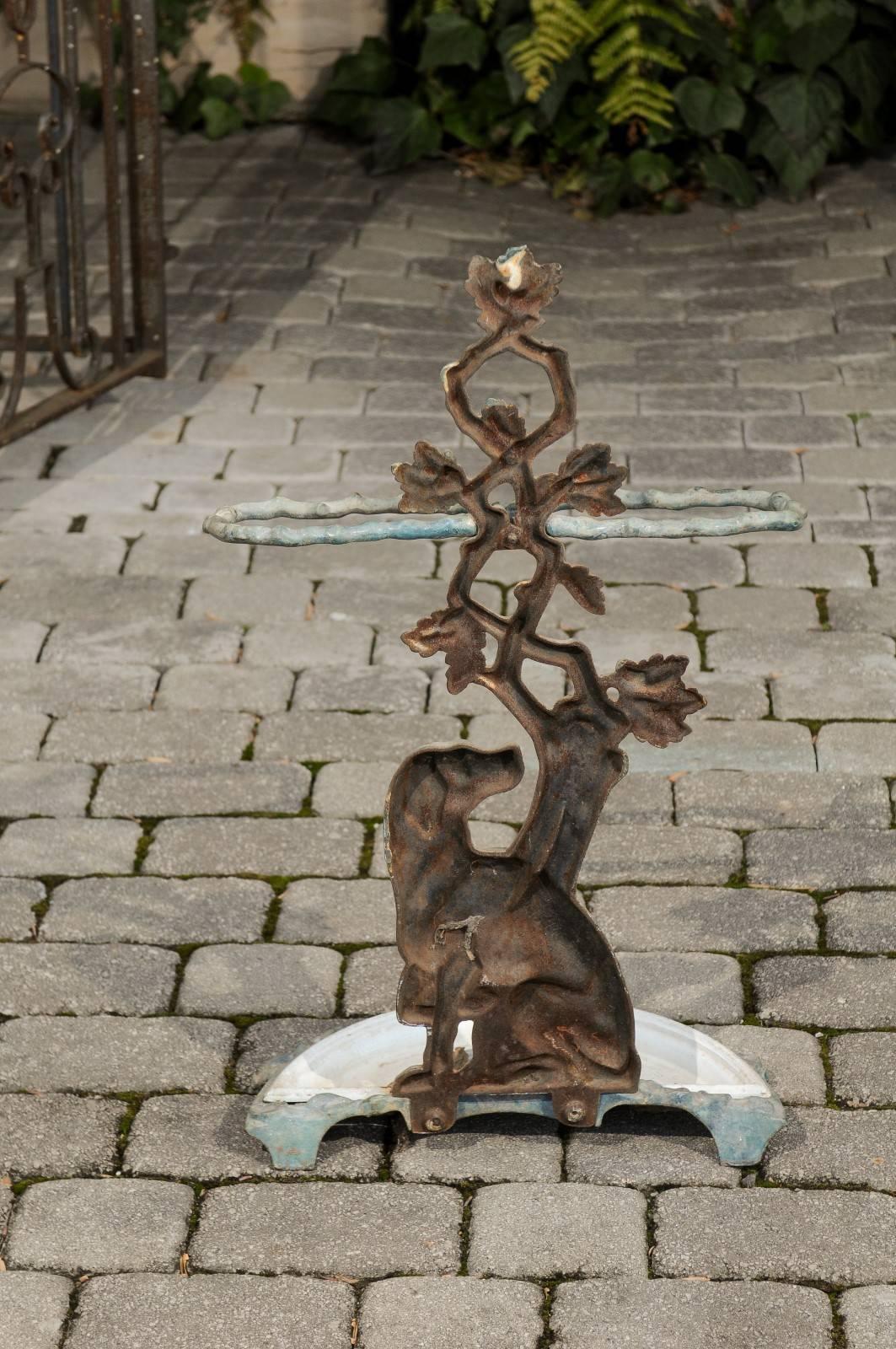20th Century French 1900s Cast Iron Umbrella Stand Depicting a Dog Sitting in Front of a Tree For Sale