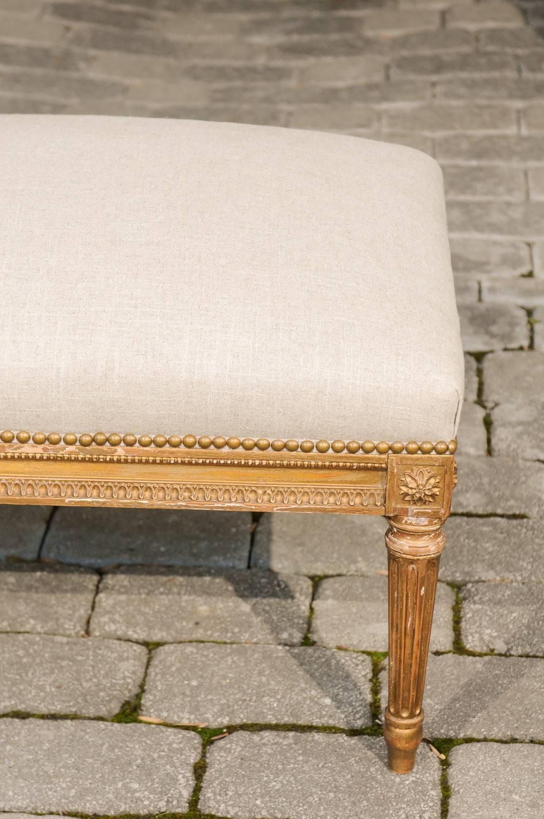 French Louis XVI Style 1920s Upholstered Ottoman with Giltwood Base and Rosettes In Good Condition In Atlanta, GA