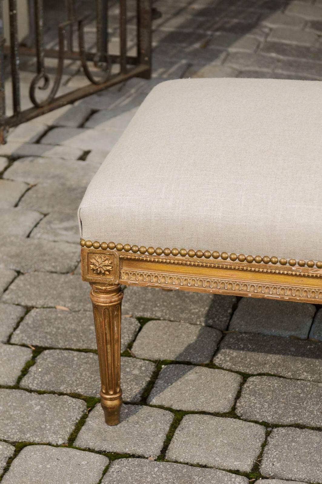 20th Century French Louis XVI Style 1920s Upholstered Ottoman with Giltwood Base and Rosettes