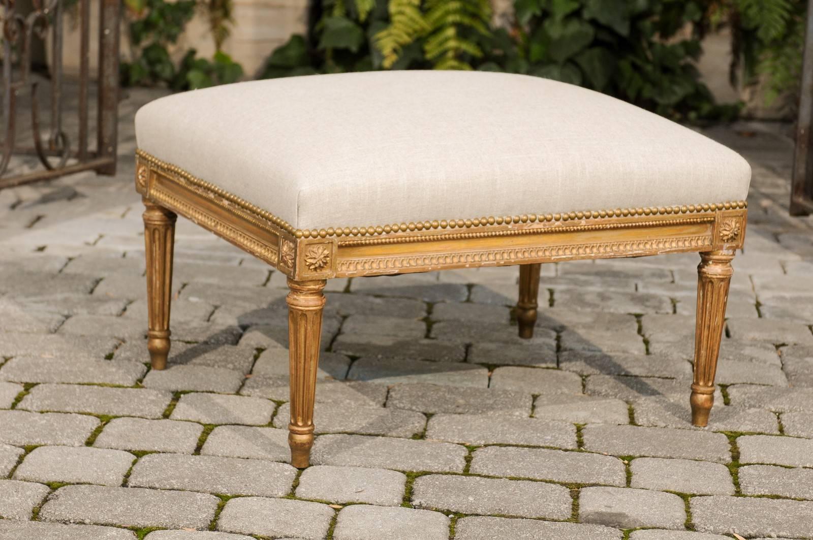French Louis XVI Style 1920s Upholstered Ottoman with Giltwood Base and Rosettes 1