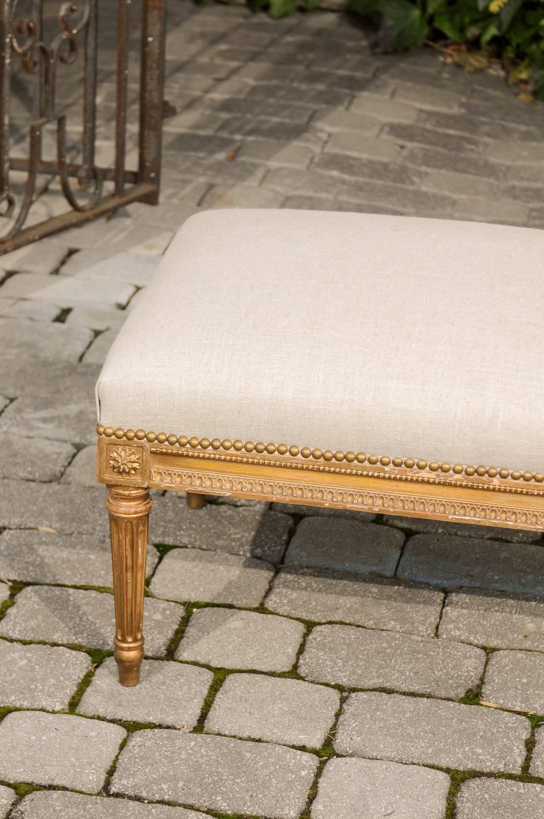 Brass French Louis XVI Style 1920s Upholstered Ottoman with Giltwood Base and Rosettes