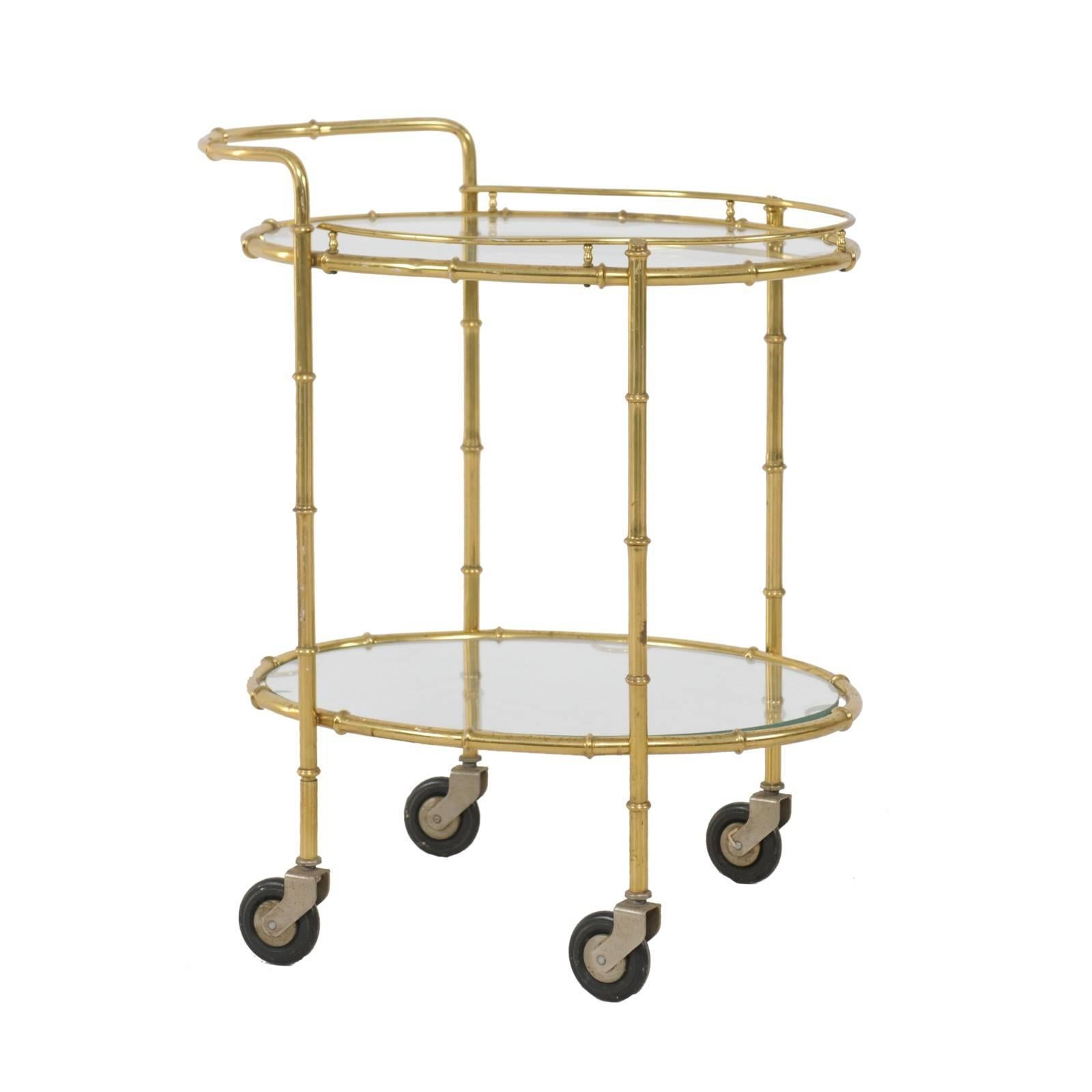 French Midcentury Brass Two-Tiered Oval Cart with Glass Shelves and Casters For Sale