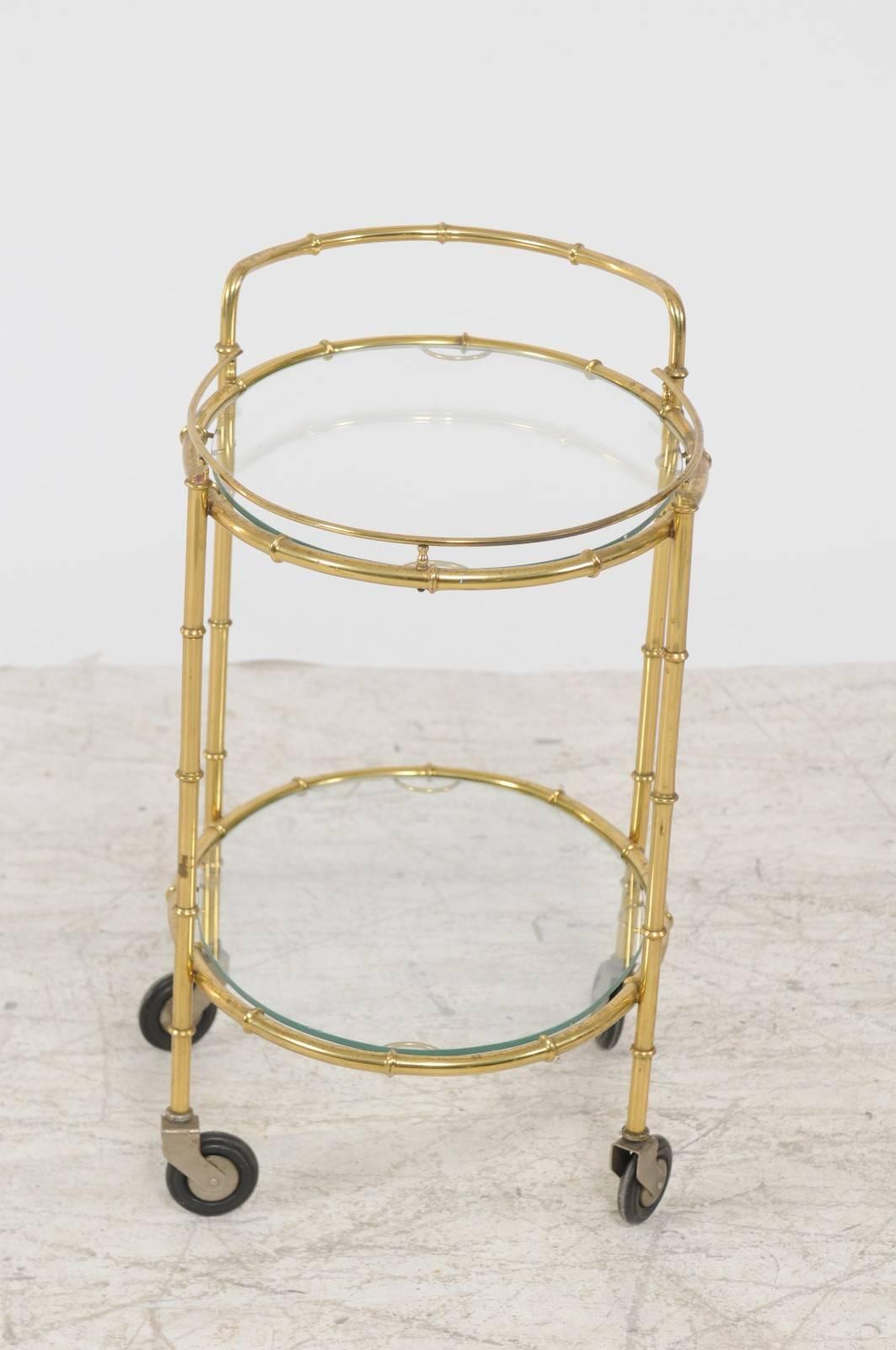 French Midcentury Brass Two-Tiered Oval Cart with Glass Shelves and Casters For Sale 1
