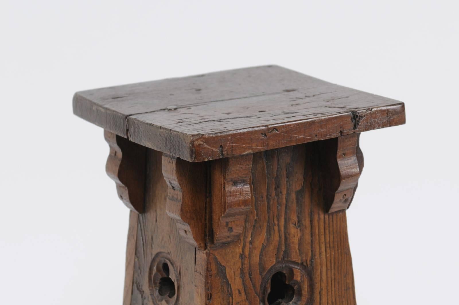 Rustic Spanish Oak Stool with Trefoil Motifs and Brackets from the Early 20th Century