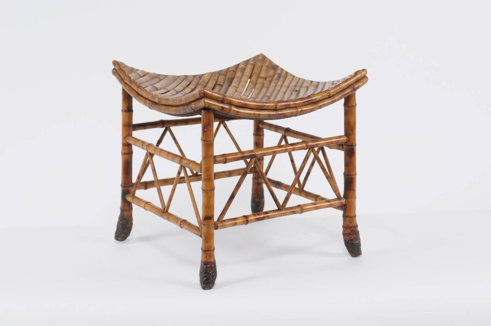 An English Egyptian Revival bamboo Thebes stool from the early 20th century. This English Thebes stool is a perfect example of the enthusiasm for everything Egyptian that started in the early 19th century with Napoléon I's conquest of Egypt and that