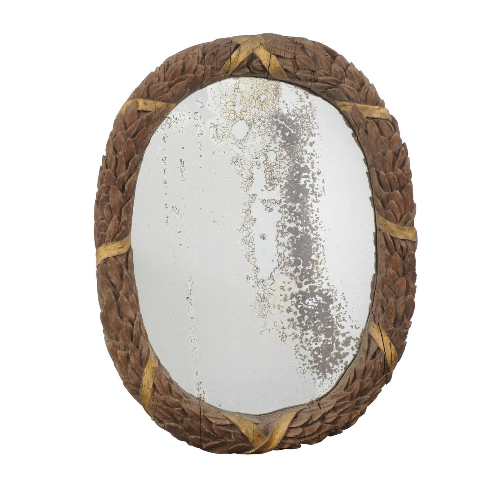 Oval French Neoclassical Parcel-Gilt Ribbon-Tied Wreath Mirror, circa 1880