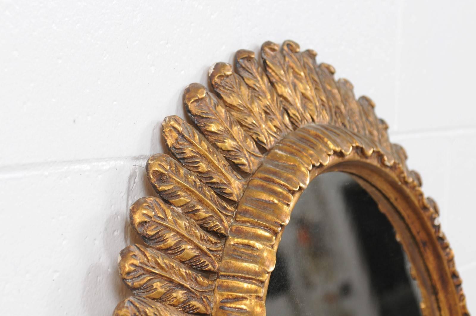 French Vintage Giltwood Sunburst Mirror with Waterleaves from the Midcentury 3