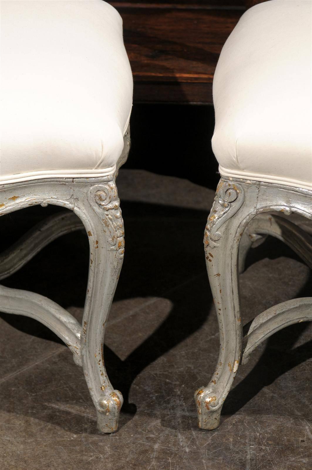 Pair of French Louis XV Style Silver Leaf Stools with Carved Cross Stretcher For Sale 1