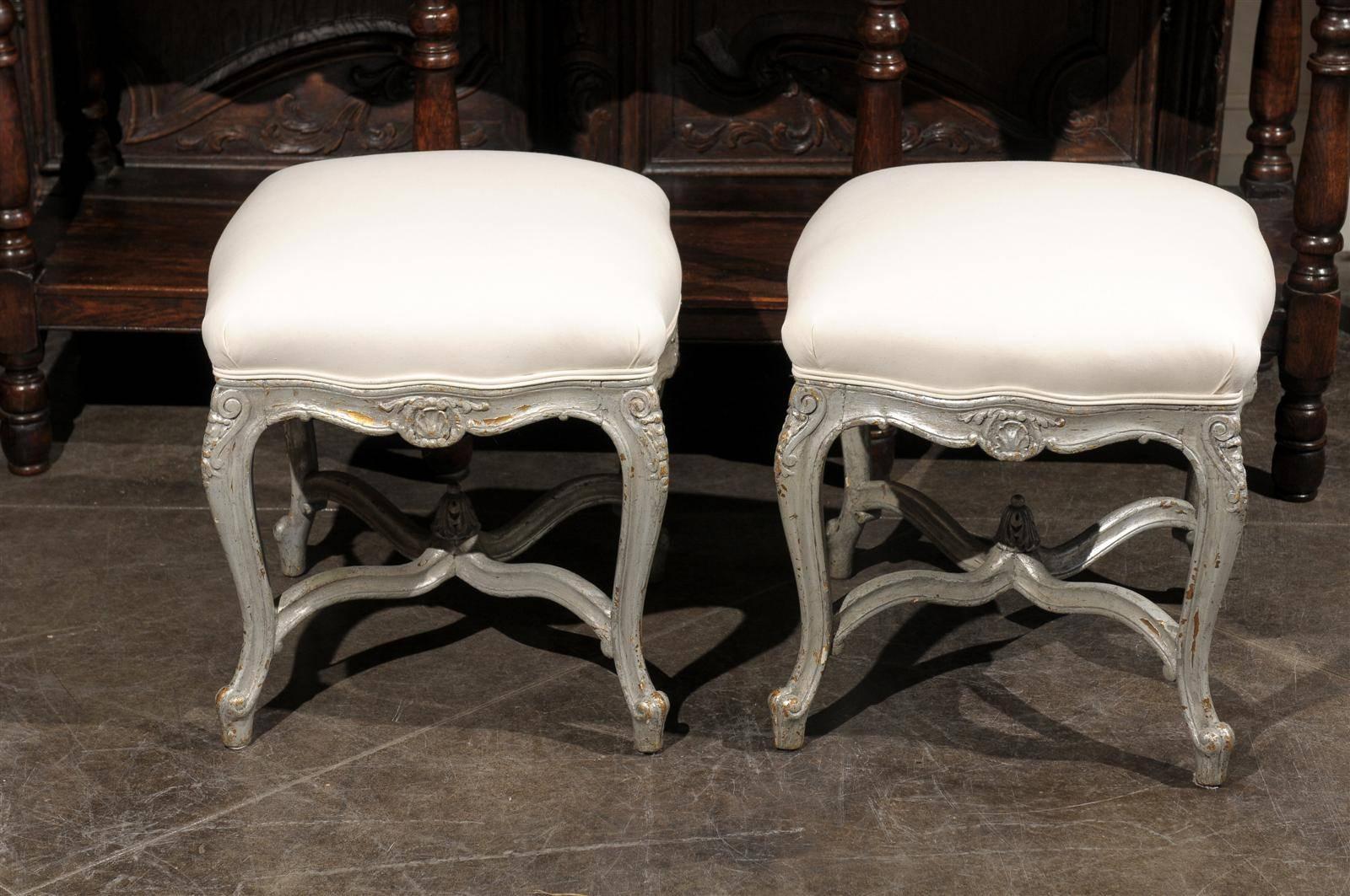 Pair of French Louis XV Style Silver Leaf Stools with Carved Cross Stretcher For Sale 1