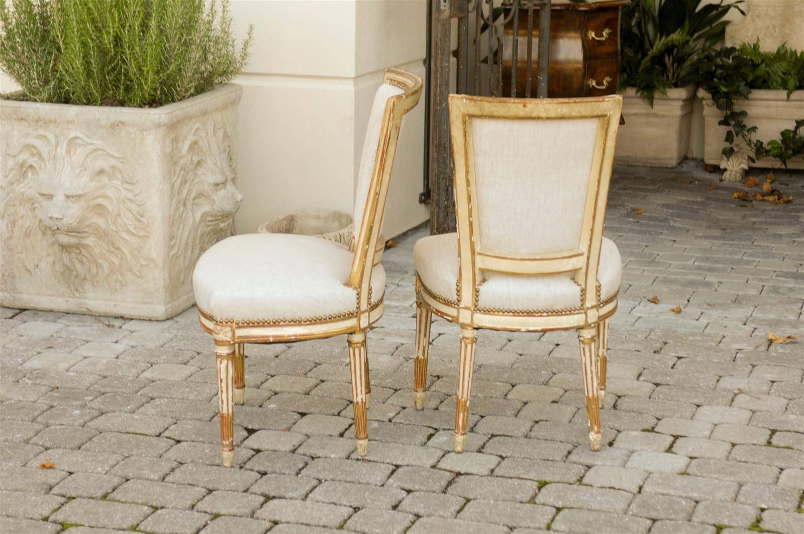 Gilt Pair of French Louis XVI Style Painted and Gilded Upholstered Side Chairs, 1860s