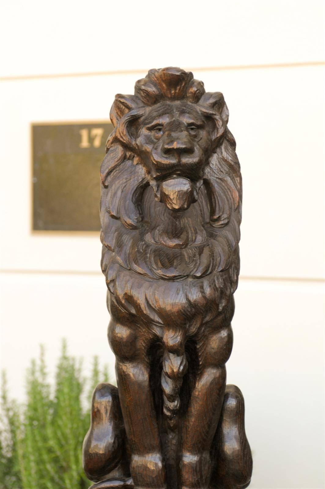 Pair of English Late 19th Century Large Wooden Carved Lions on Bases 1