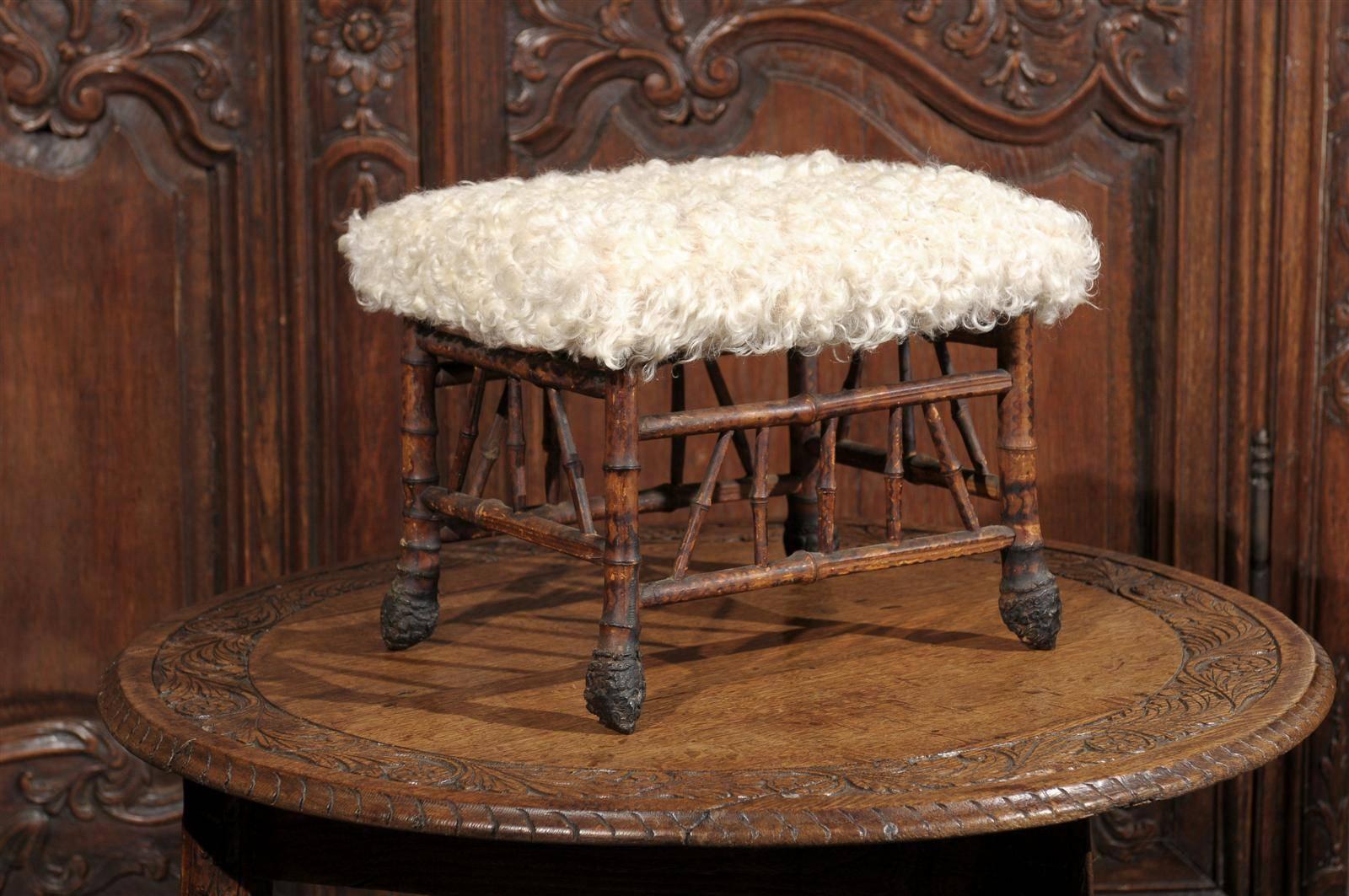 Faux Bamboo Stool with sheep skin top.