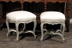 Pair of French Louis XV Style Silver Leaf Stools with Carved Cross Stretcher