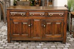 English Early 19th Century Oak Buffet with Three Drawers and Two Doors