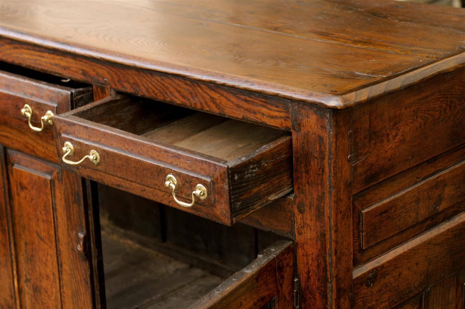 Brass English Early 19th Century Oak Buffet with Three Drawers and Two Doors