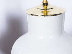Pair of White Porcelain Table Lamps with Brass Mounts and Giltwood Bases