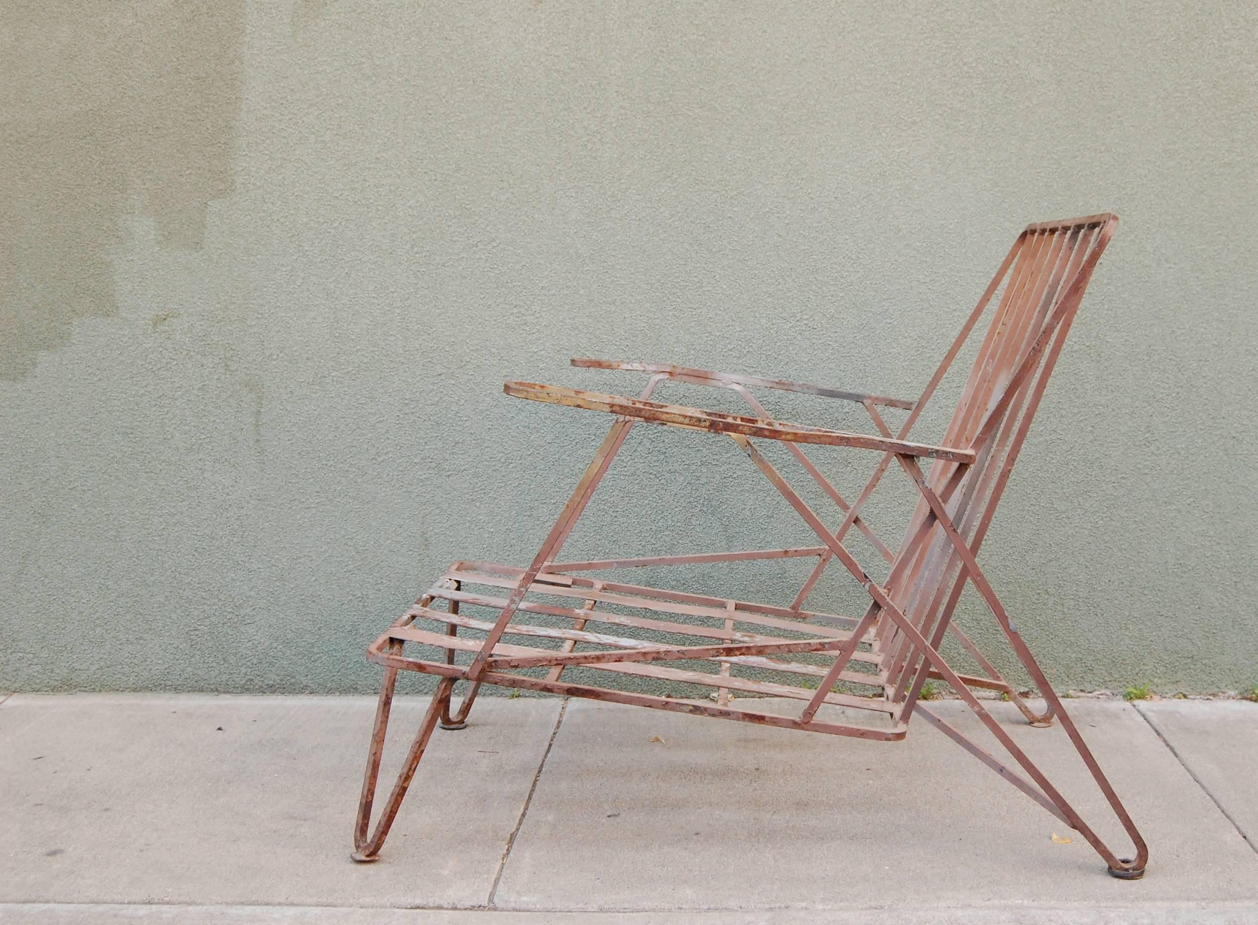 1950s era modernist iron patio lounge chair, clearly all original condition with a vibey patina to the metal. Great architectural construction and we are of the mind set it should be left as is, just add cushions, which we can also accommodate if
