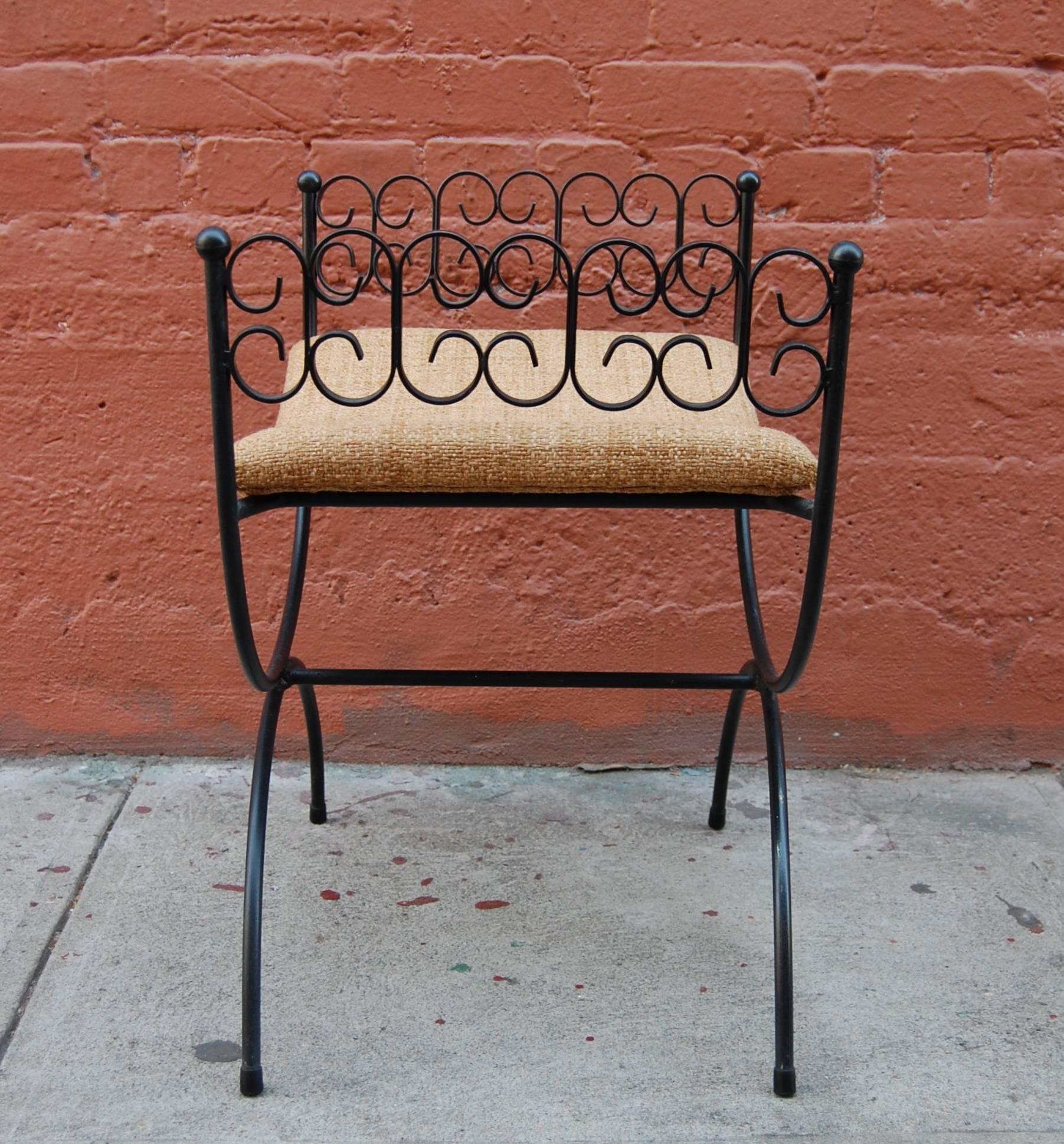 Wrought iron bench or vanity stool #C116 princess bench designed by New York designer Arthur Umanoff for Shaver - Howard & Boyuer - Scott and distributed through Raymor. Original black lacquer finish with new Knoll Sonnet Butterscotch upholstery