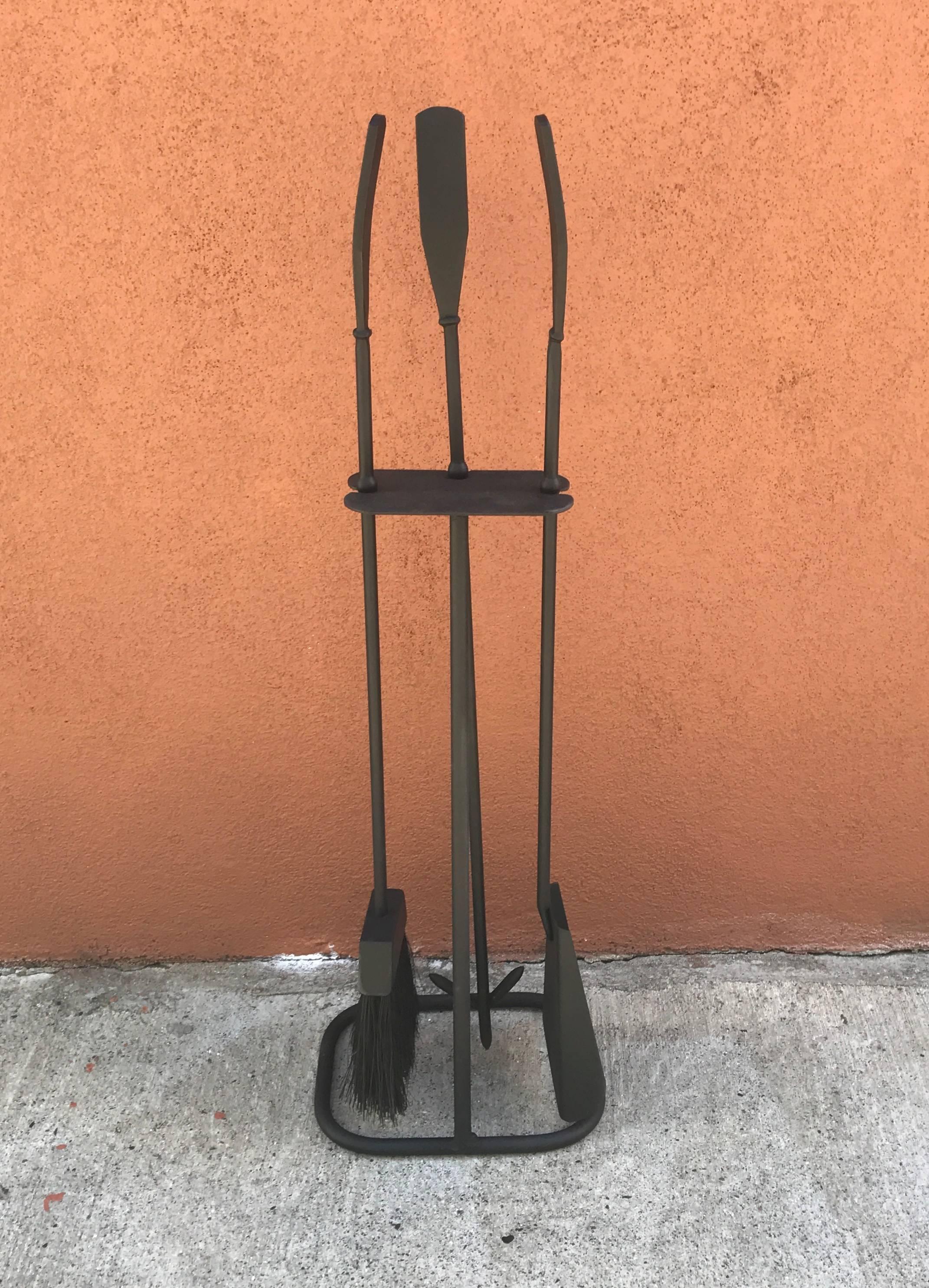 1950s modernist iron fire tool set, consisting of a dust pan, brush and poker, all in excellent condition and newly resprayed.