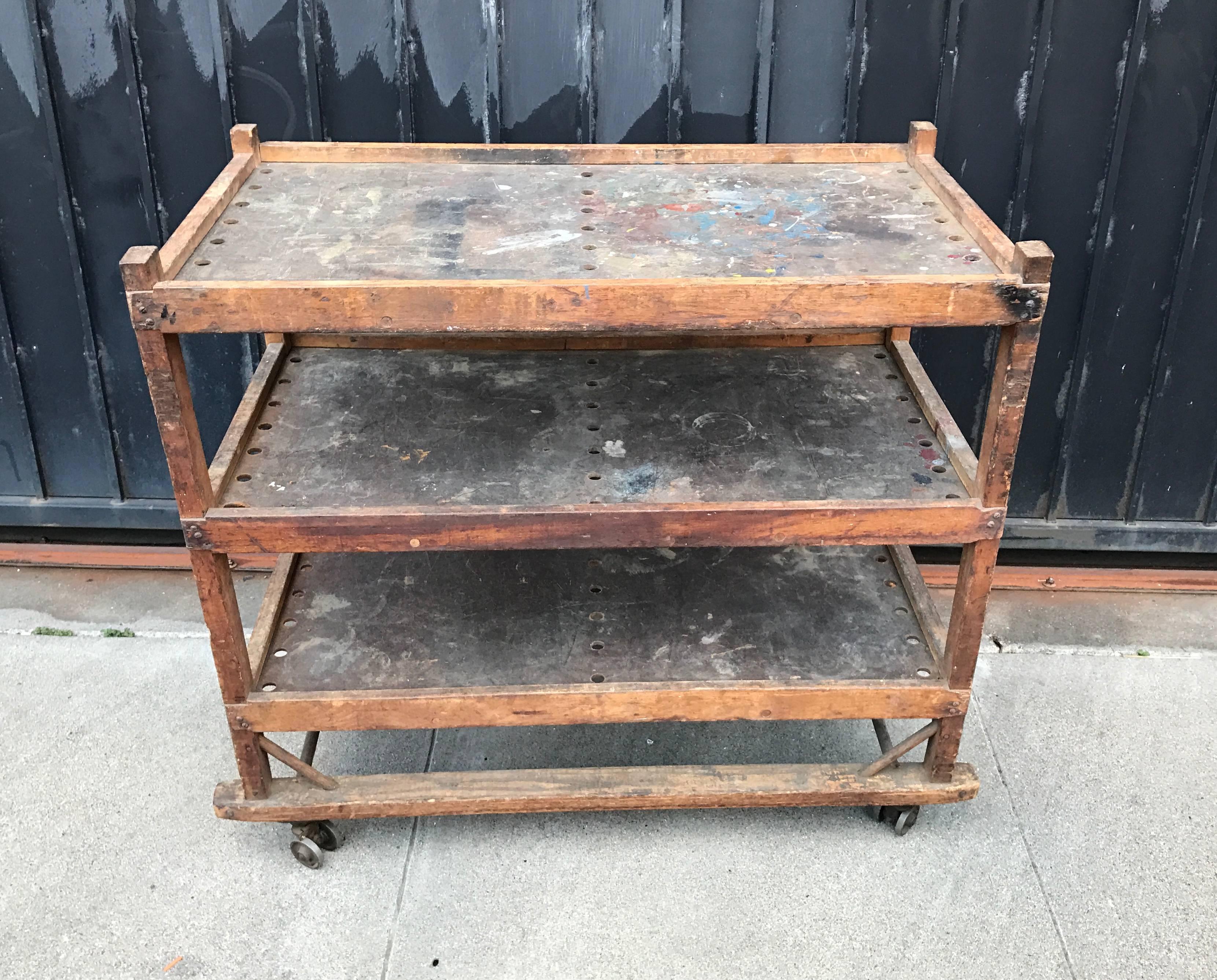 Used in shoe factories during the 1920s-1930s is this shoe cart or rack (note shoe sizes in image 10) the rollers are steel and work perfectly, great construction details on this cart which is sturdy as well. Great patina to the surfaces and would