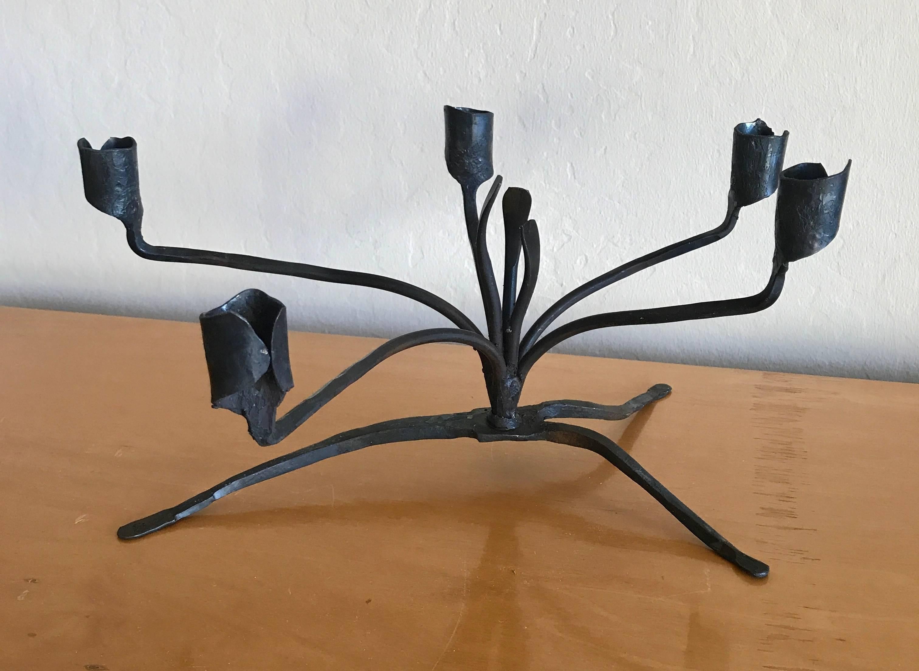 California Blacksmith Artist C. Carl Jennings hand-forged signed iron table candelabra created in the 1960s in his studio El Diablo Forge in Lafayette east of Berkeley which he open in 1947. The form is organic and very plant like, from the estate