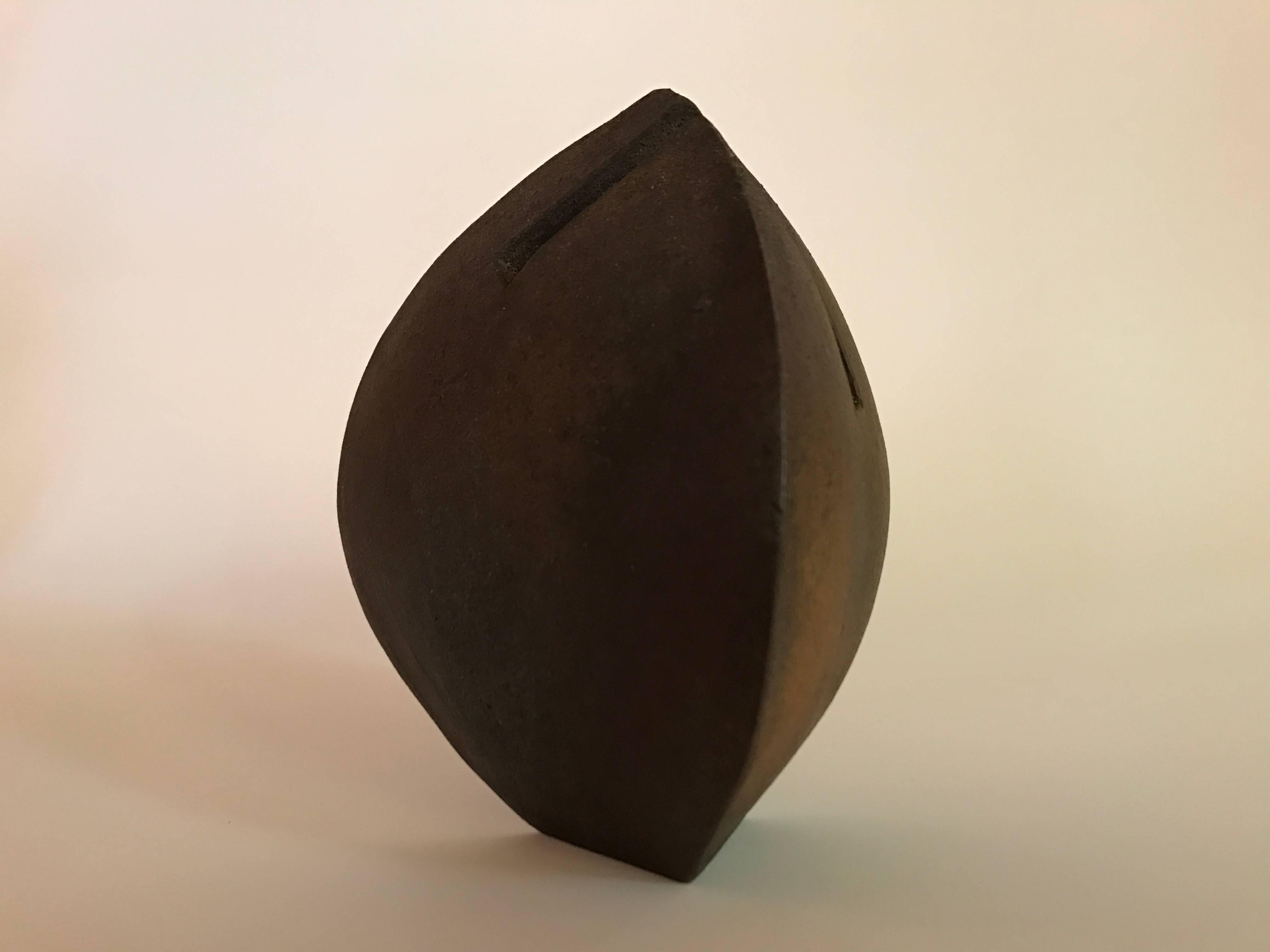 Amazing wood-fired sculpture by master potter, Malcolm Wright. Made from pure Georgia brick clay, circa 2003. 

Wright's career started after a trip to Japan in 1970, and is still making amazing work today in Marlboro, VT. Artist statement (from