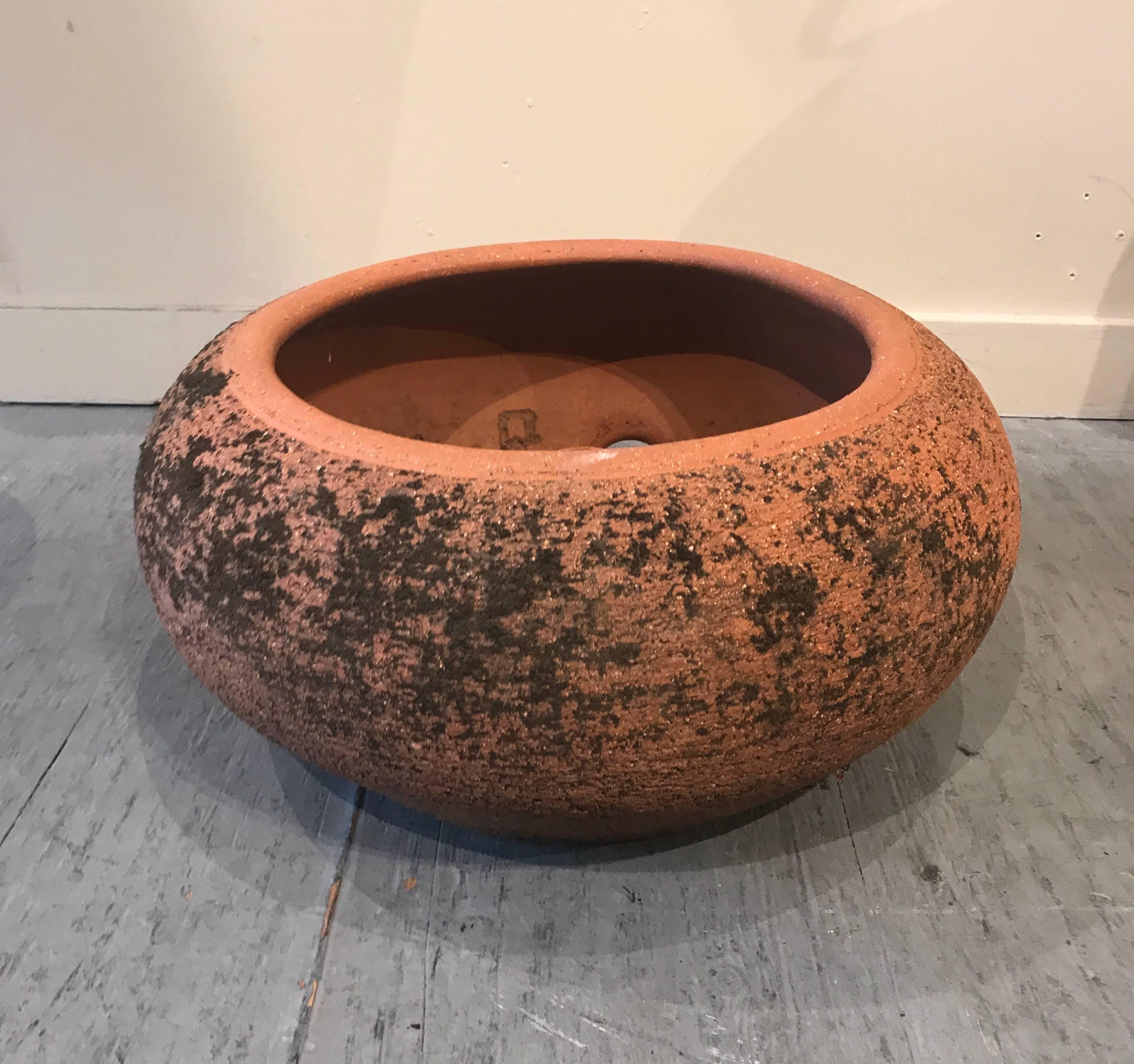 Early studio made garden hose pot by California artist Stan Bitters for Hans Sumpf, great color and texture, keeps the garden hose tidy. Stan Bitters is a well-known studio potter, he has had many group and solo shows over the course of his long