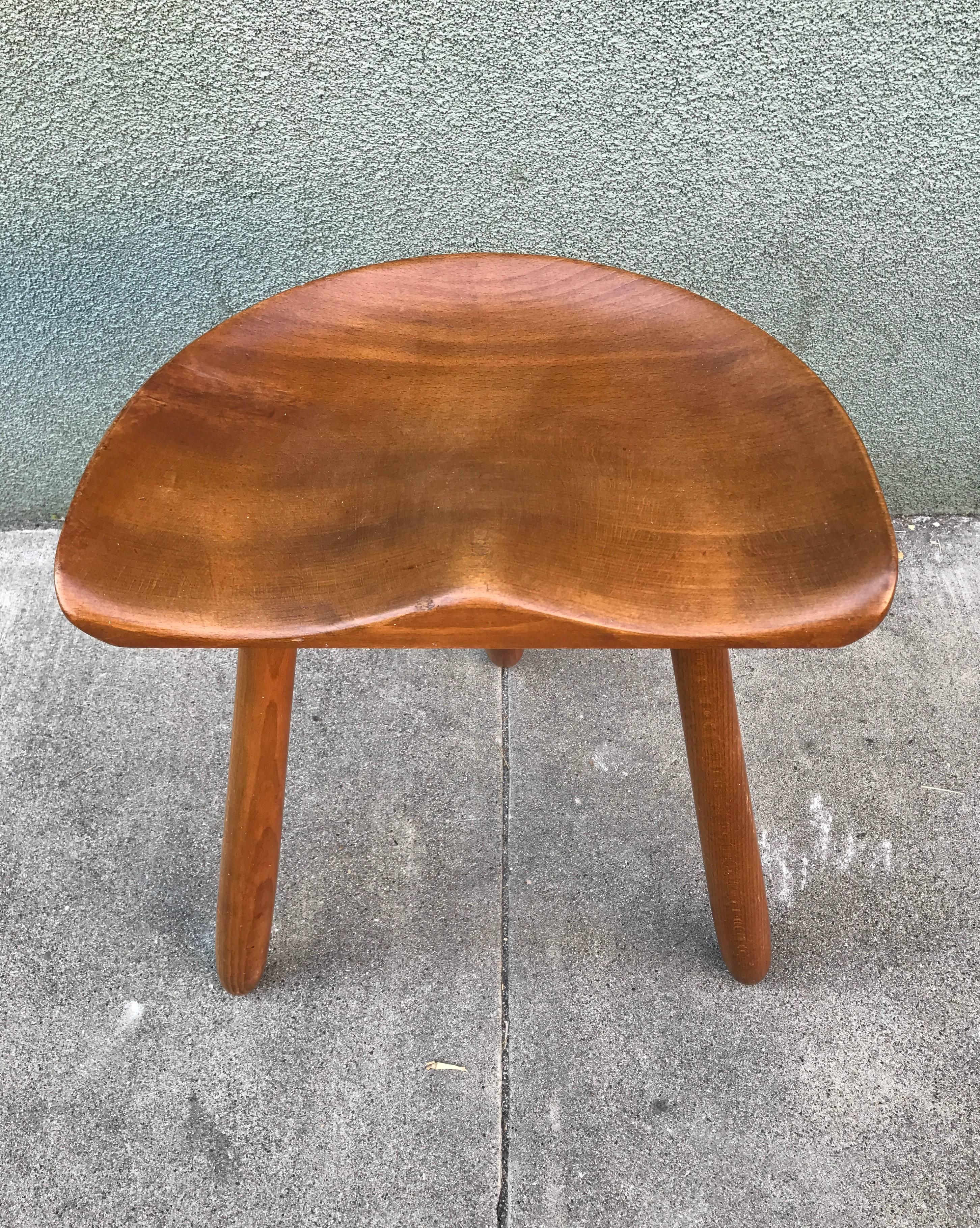 Arne Hovmand three legged milking stool, Danish Modern verison of the ones used for hundreds of years in Northern Europe. This example is constructed of beechwood and is stamped on the bottom made in Denmark.