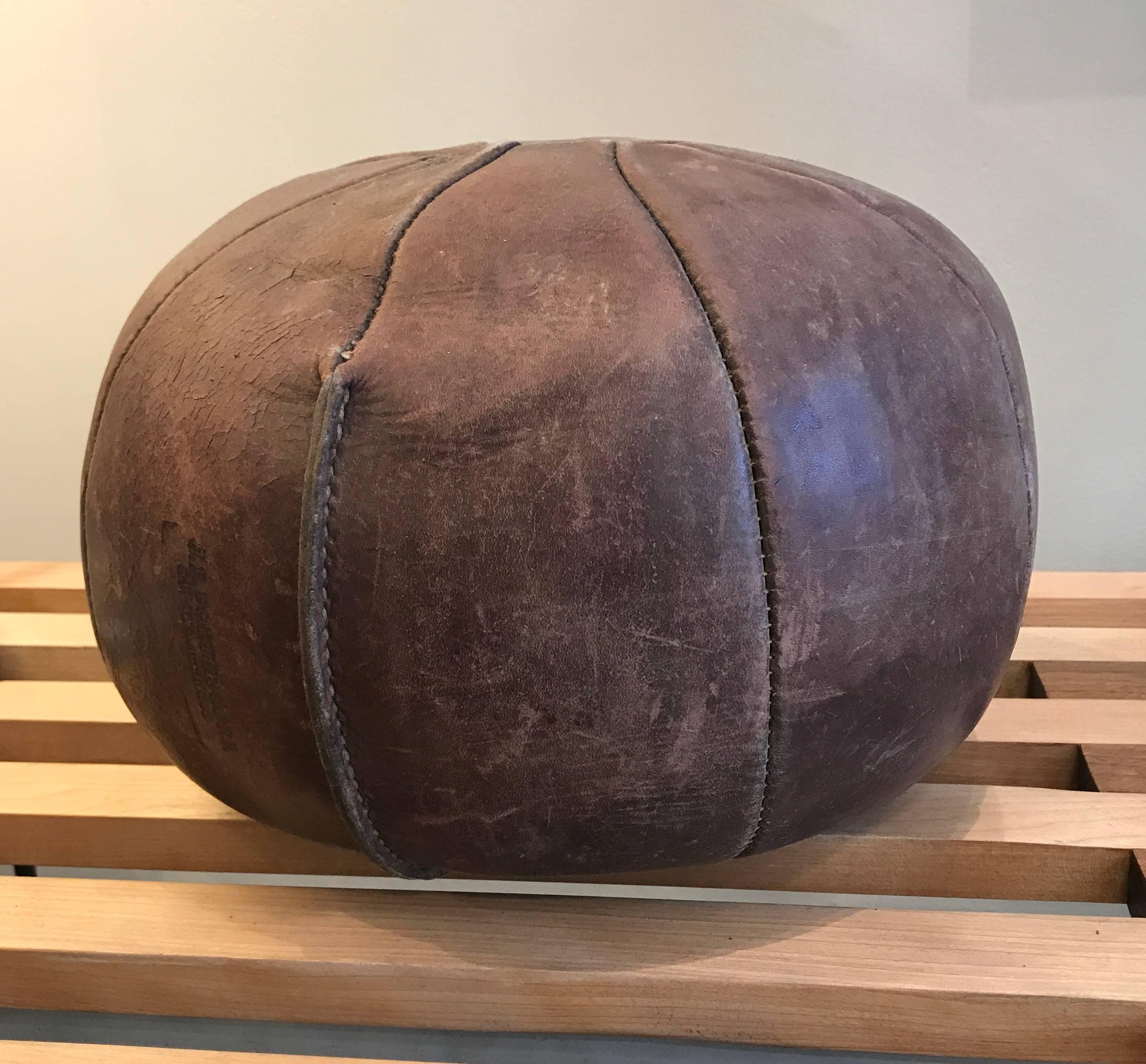 Vintage leather medicine ball in great condition with a great patina. Made by the J. E. Porter Corporation. 