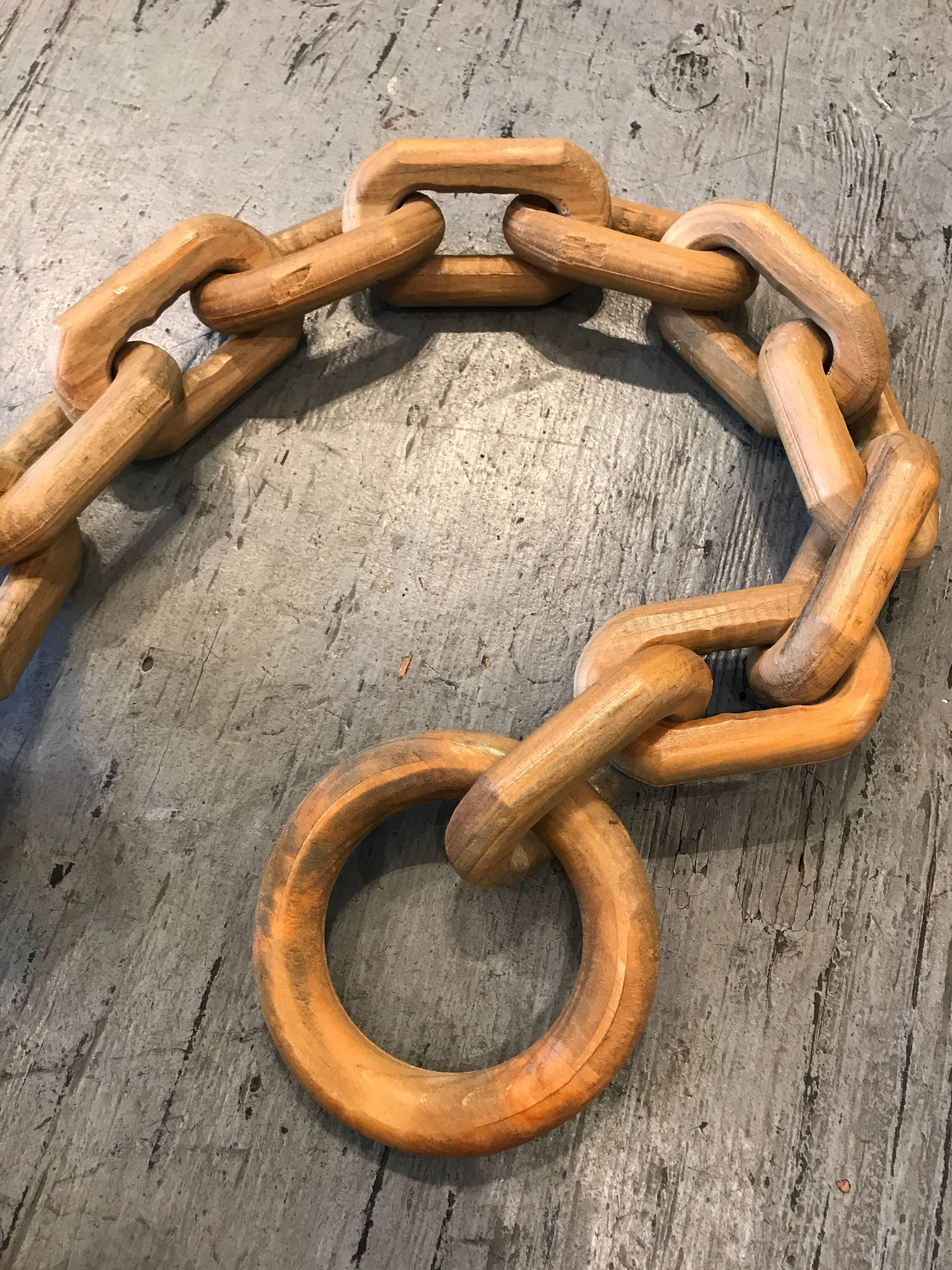 Hand-carved wooden anchor and chain with a Nautical Folk Art aesthetic.
 