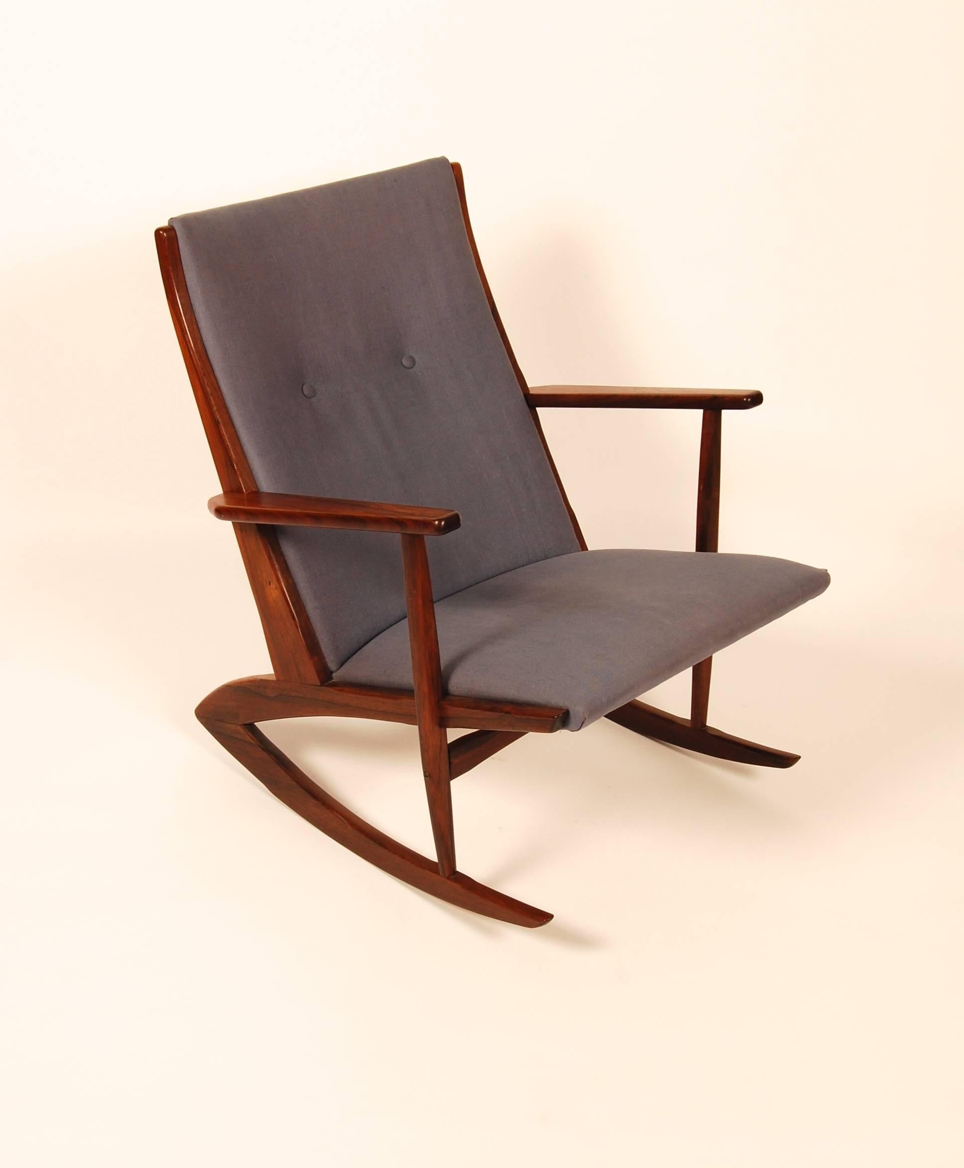 With it's grasshopper like form, Holger George Jensen's 1958 design is a interesting approach to the rocking chair. Another novel design element, in much like a sailboat, this chair has ballast under the front seat to create balance in response to