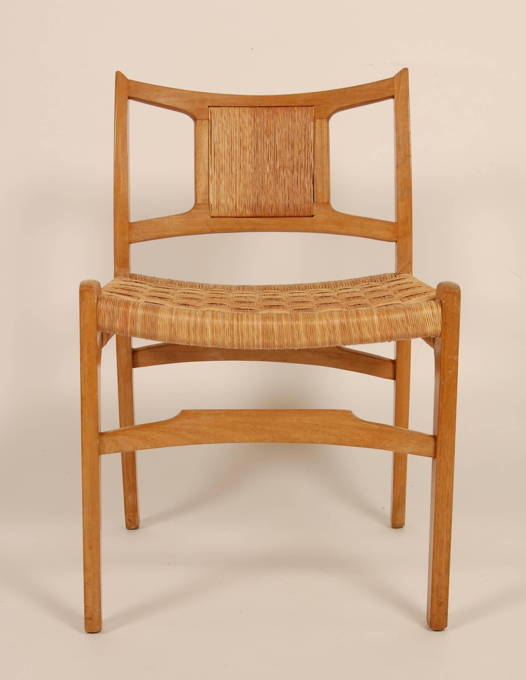 Side chair designed by Edmond Spence for Industria Mueblera fo Mexico, circa 1950s, constructed of blonde mahogany with a jute sit and back, beautiful all original condition. 