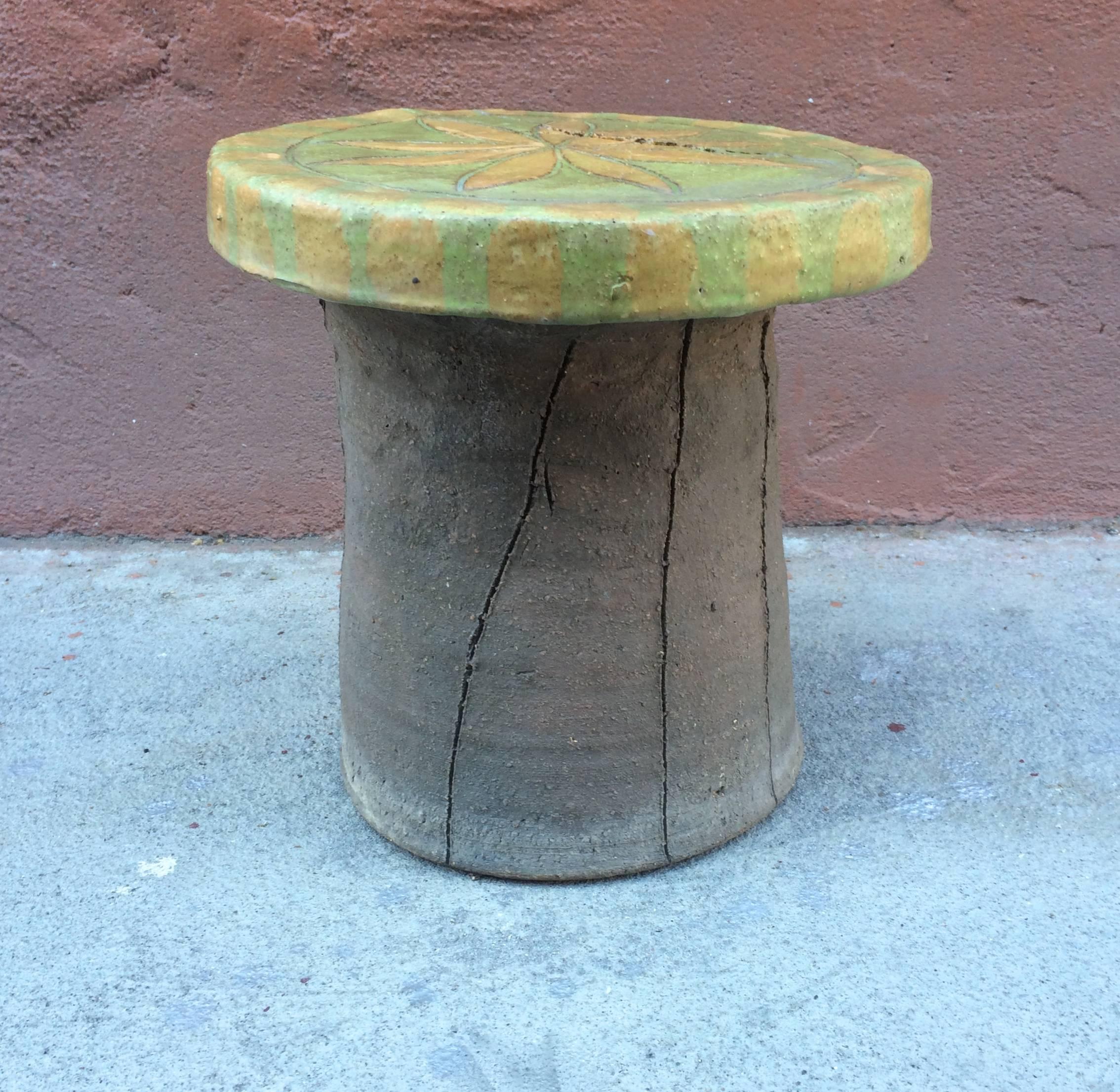 Ceramic flower stool by California ceramic artist Stan Bitters for Hans Sumpf, this appears to be an earlier example and may have been part of Bitters developing technique as this example has a firing crack which does not affect the structural