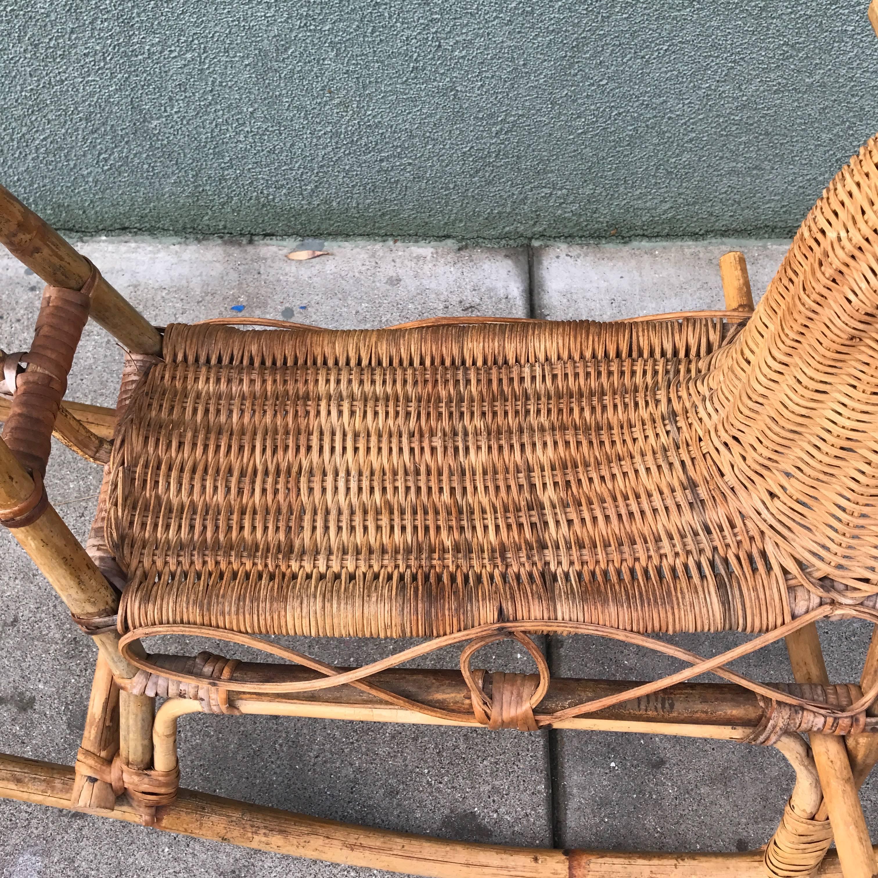 Child's woven rattan rocking horse, in excellent vintage condition with a great patina to the wicker or rattan. A nice playful sculptural abstract form for a kid's room.