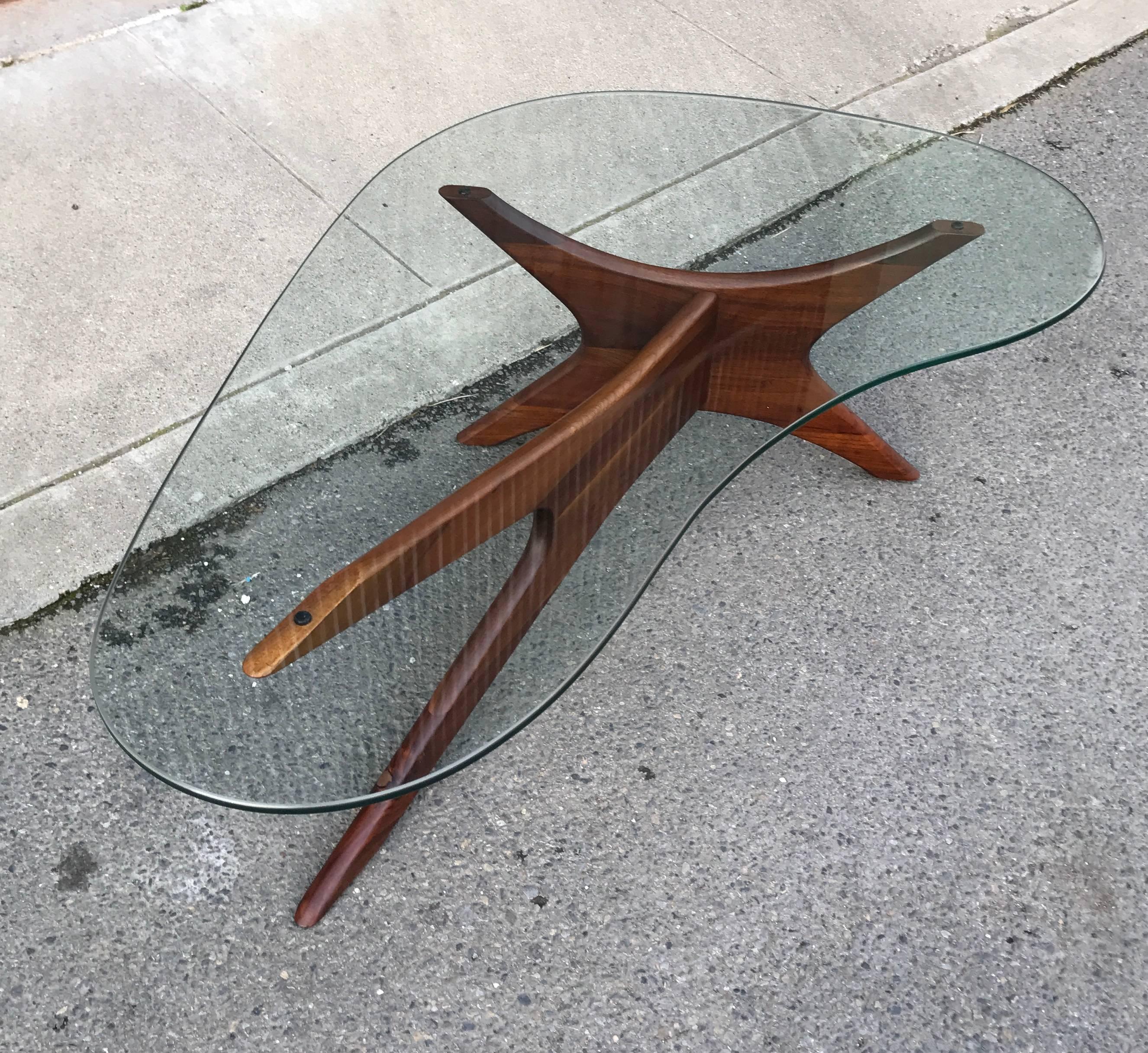Adrian Pearsall (1925-2011) biomorphic glass top coffee table with a solid walnut tripod base for Craft Associates. All original top and base, the top has age appropriate wear with Fine marks to the glass and the base in excellent condition has a