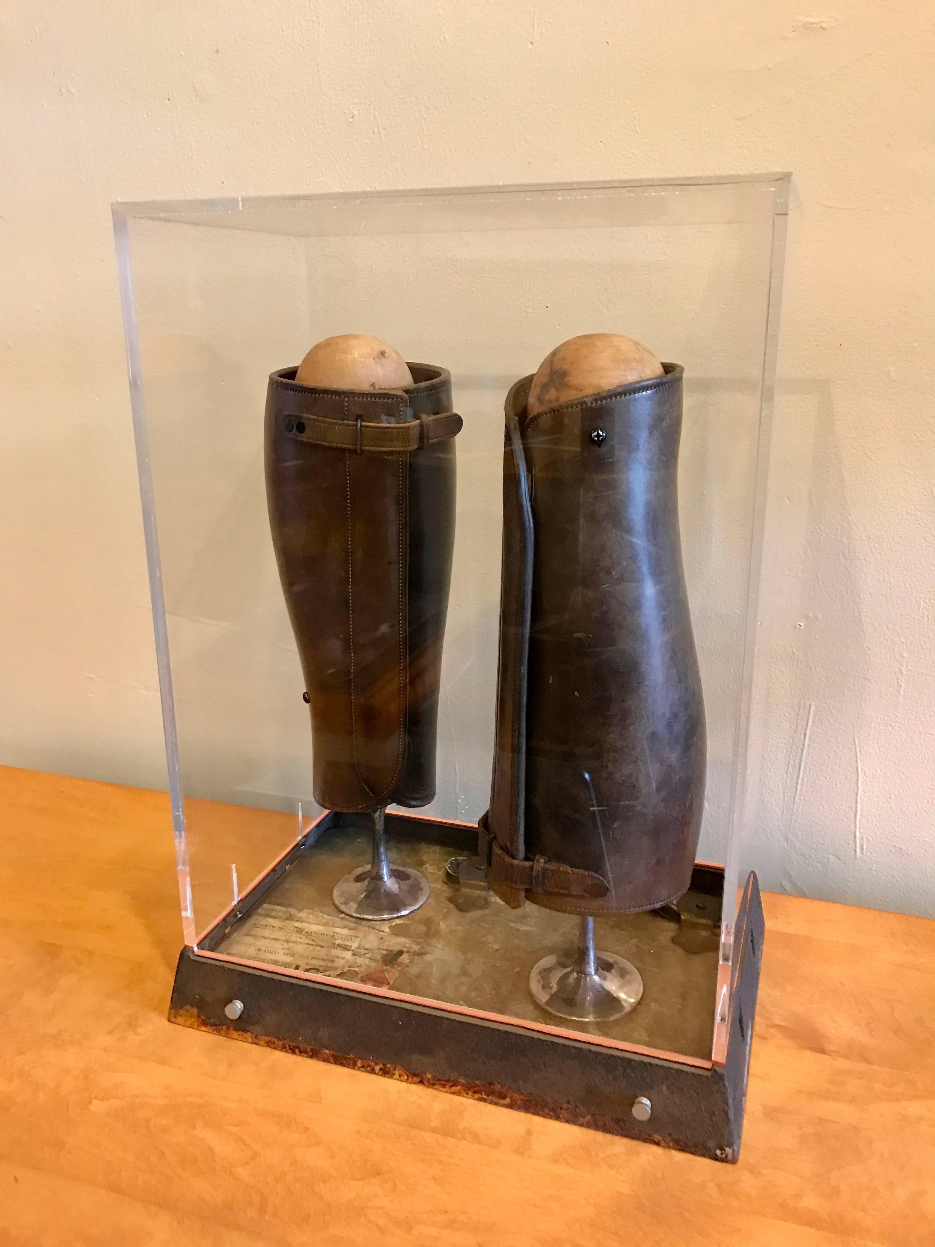 Mixed media abstract sculpture by Bay Area artist Scott Davis lll, this sculpture is titled "Twins" and was created in 1991, a mixture of leather, wood, paper and metal parts enclosed in an acrylic case, signed and dated. Davis's has had