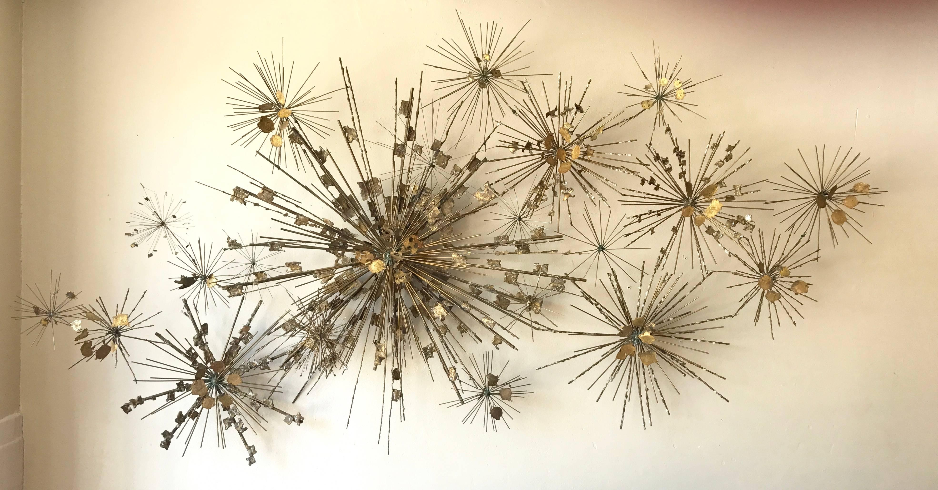 Created locally by an unknown Bay Area artist during the 1970s is this mixed metal one off wall hanging sculpture. Constructed of hundreds of brass and bronze wire rods brazed together to create an celestial body or oceanic life form. The mixture of