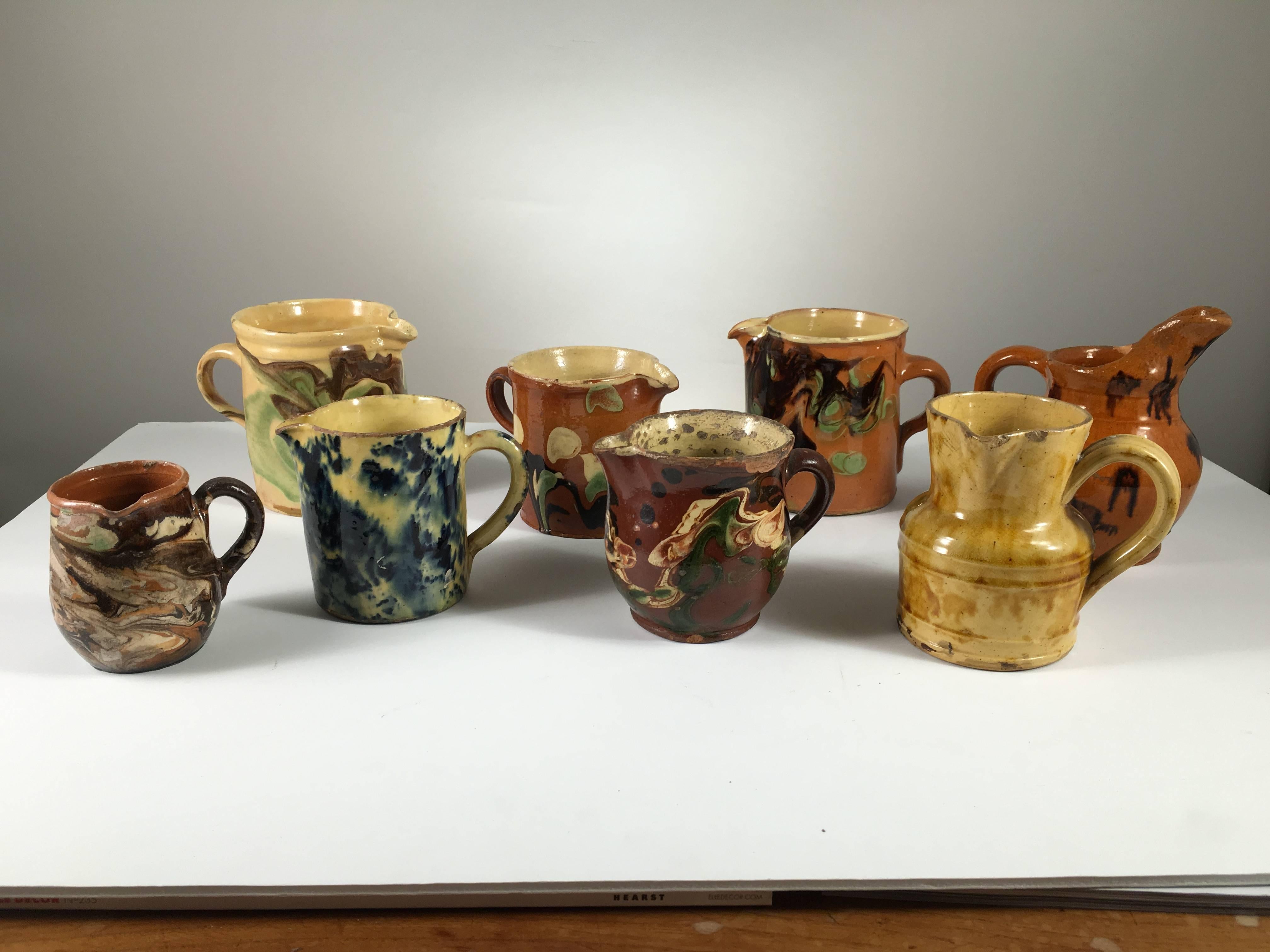 Collection of Eight Small French Provincial Jaspe Cream Pitchers, 19th Century 5