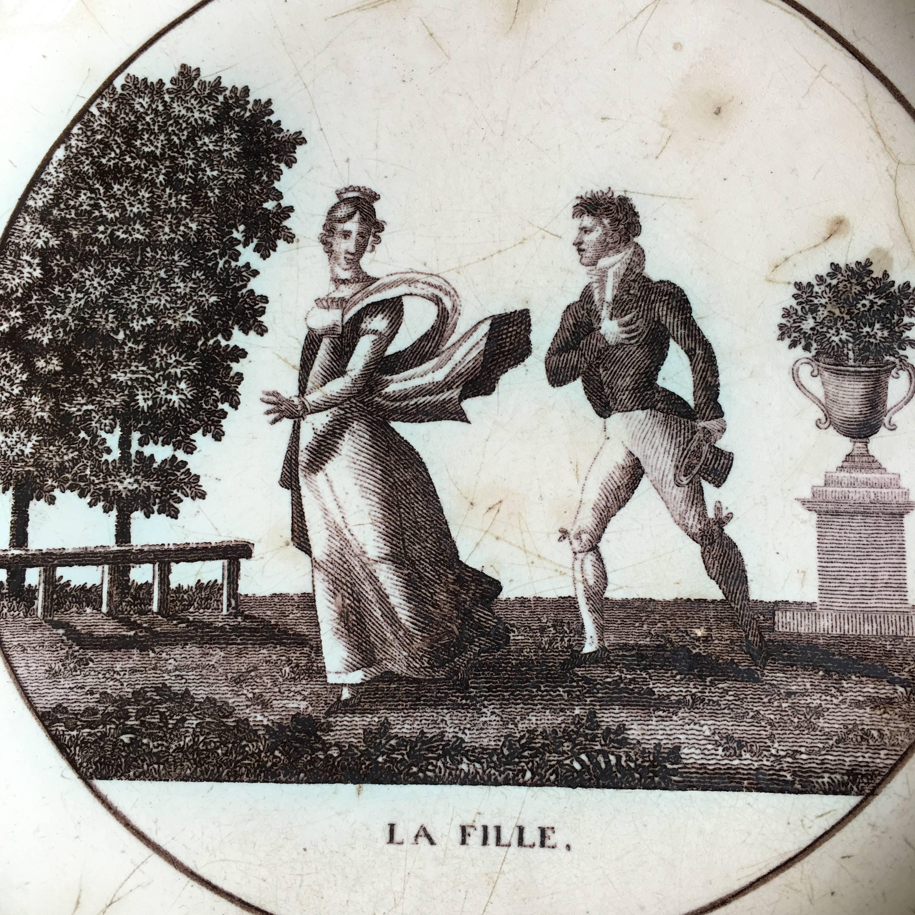 An early 19th century French Empire period pictorial plate from Creil, circa 1810, depicting a wonderfully stylized scene of a man courting a woman. Great graphic appeal. Signed 