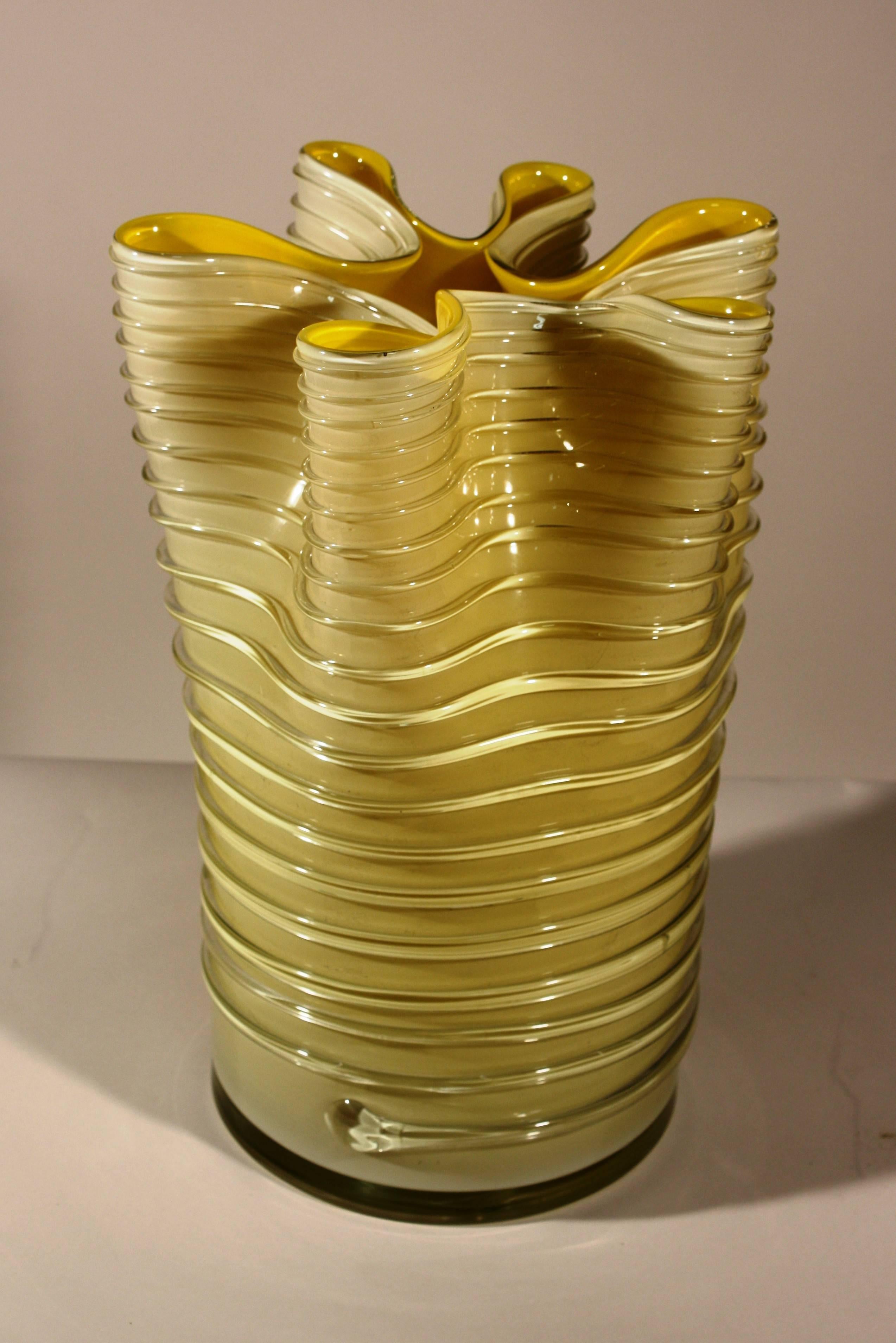 A large handblown Venetian art glass vase in yellow and cream, probably Murano, in the modernist style, circa 1960, with applied glass spiral ribbing.
