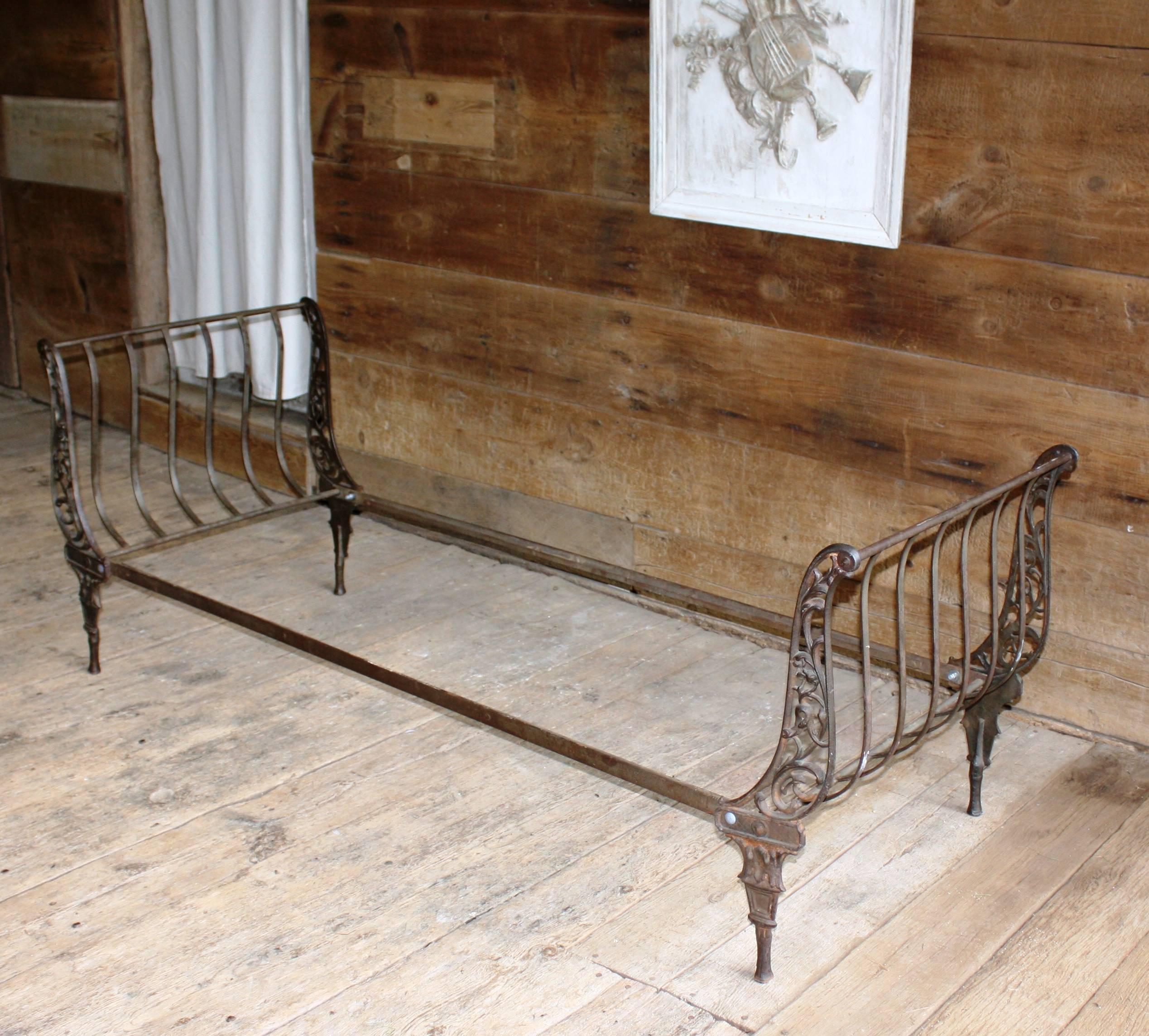 A charming, Napoleon III period, cast-iron daybed, French, circa 1870, unusually narrow, great size for a sofa. Very sturdy.

Mattress size 72" long x 29" deep. Side rail height 12".