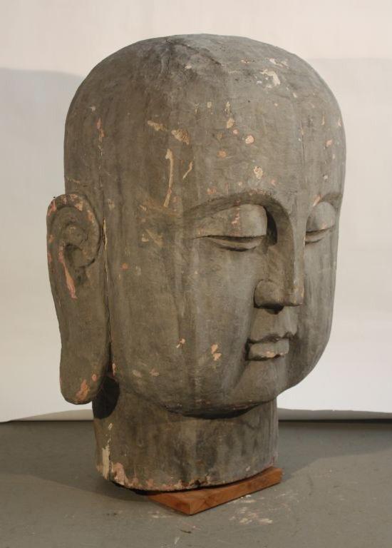 carved wooden buddha head