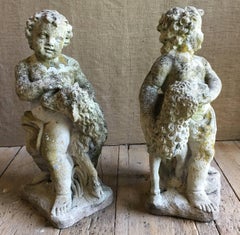 Coppia di statue da giardino Putti con agnelli